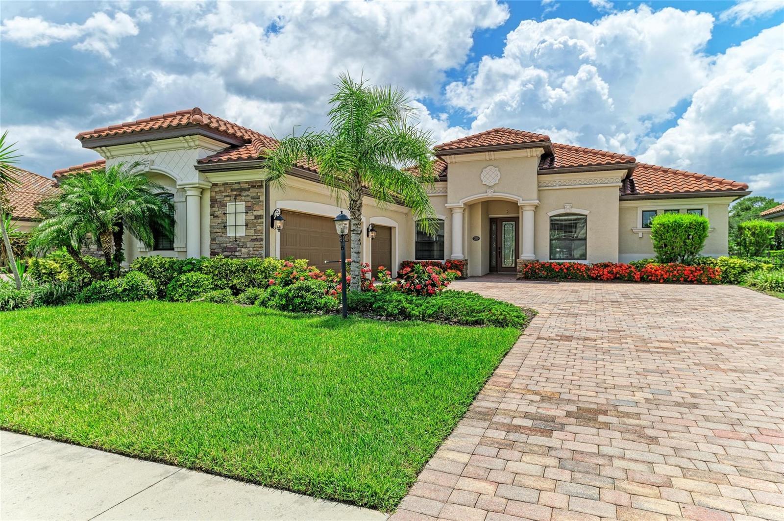 One or more photo(s) has been virtually staged. OH, WHAT A VIEW !!! JUST REDUCED........ Welcome to 13819 Swiftwater Way.... NEW PRICE, NEWLY REMODELED KITCHEN AND BATHS......This beautifully maintained Cambridge model is perfectly situated towards the end of a cul de sac features warm dark hardwood floors and oversized tile flooring and features 4 bedrooms and 2 1/2 baths. Imagine yourself sitting out back on the expansive lanai and enjoying magnificent preserve and water views will take your breath away. The gourmet kitchen is a chef's dream with a 5 burner gas stovetop and double ovens. Deep sink with touch faucet, granite counters and more. Enjoy Amazing sunsets over the water from a large screened lanai with a heated in ground pool and spa. The outdoor kitchen has a gas grill and beverage fridge. An oversized master suite with his and hers vanities, a soaking tub and a walk-in shower. Two guest bedrooms plus home office/den with double doors for privacy and could double as a 4th bedroom if needed. Large 3 car garage is ideal for storage. Bridgewater is a Gated community where landscaping is included in the low HOA. This home is conveniently located adjacent to James L Patton Park, with a lake, boat launch, and trails for outdoor activities. Close to shopping and restaurants...Bridgewater is centrally located, gated and a maintenance assisted community. Great place to call home....Will not last !!! SOME PHOTOS VIRTUALLY STAGED