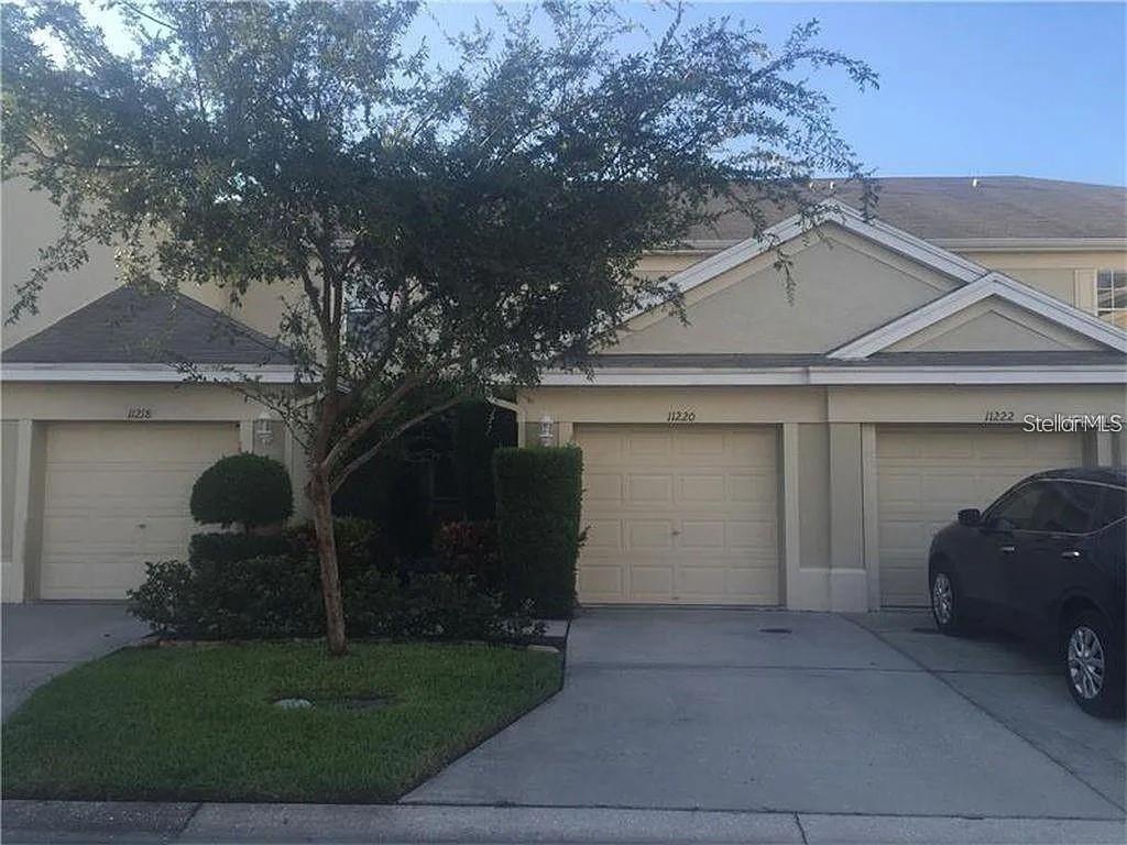 Welcome to this beautifully maintained 2-bedroom, 2.5-bath townhome in the highly sought-after Windsor Place community, nestled in the heart of the Westchase area. Combining comfort, style, and low-maintenance living, this move-in-ready home is perfect for first-time buyers, professionals, downsizers, or anyone looking to enjoy one of Tampa's most desirable locations. Step inside to an inviting open-concept floor plan featuring spacious living and dining areas, a well-appointed kitchen with ample cabinetry and counter space, and a convenient half bath on the main level. Upstairs, you'll find two generously sized bedrooms, each with its own private en-suite bathroom, offering the perfect blend of comfort and privacy. Relax with your morning coffee or unwind after a long day on the private screened lanai, and enjoy the added convenience of an attached one-car garage. Enjoy a true lock-and-leave lifestyle with HOA dues of just $276 a month, which include high-speed internet, cable TV, exterior maintenance, grounds maintenance, pest control, pool maintenance, trash service, and access to the community's sparkling swimming pool. Ideally located just minutes from the Veterans Expressway, Tampa International Airport, top-rated schools, West Park Village, Citrus Park Mall, golf courses, parks, and an abundance of shopping and dining, this home places everything you need within easy reach. Whether you're searching for your primary residence, a second home, or a smart investment opportunity, this townhome offers an unbeatable combination of location, lifestyle, and value. Schedule your private showing today and discover why Windsor Place continues to be one of Tampa's most desirable communities.
