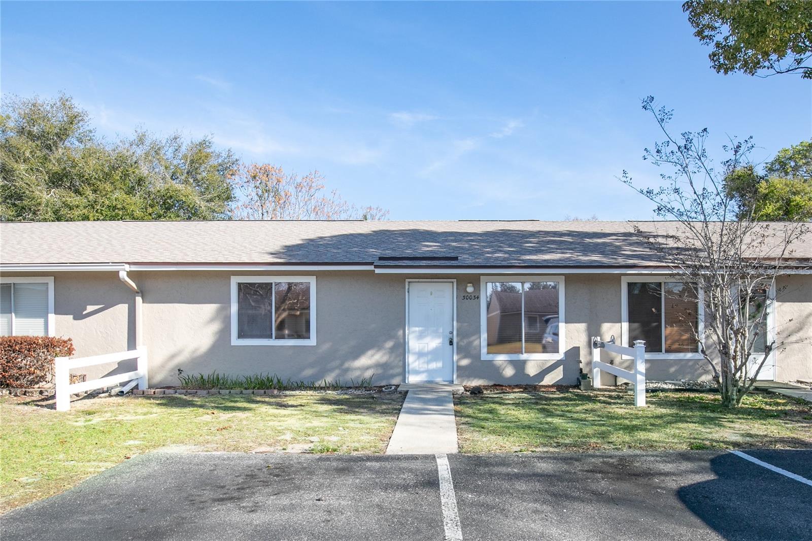 Are you ready to buy a home and stop paying rent and build equity?  This 2 Bedroom 2 Bath Condo is priced to allow you to bring your own style and updates. It offers 1,120 sq. ft. of living space. Upon entry, you'll be welcomed by a spacious open-plan living and dining area, perfect for hosting guests or relaxing in comfort. The galley kitchen is equipped with a walk-in pantry and washer and dryer hookups. The master suite features a generous ensuite bathroom with a walk-in shower and walk-in closet.  An added bonus room off the kitchen can be used for an office, craft room or family room. A great opportunity for first-time home buyer, families or snowbirds looking for a Florida winter home. The community pool offers owners a great place to swim and relax. Enjoy the convenience of condo lifestyle in a well-established community close to shopping, dining, schools, and Lake County’s beautiful chain of lakes. With a little vision, this condo can truly shine—don’t miss your chance to own in Tavares at an affordable price! This condo combines space, location, and potential all in one! Call today to schedule an appointment to view this Condo.