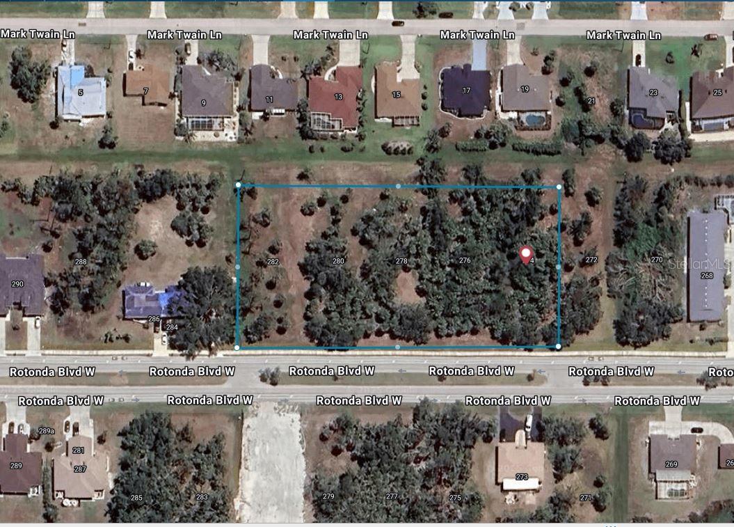 INVESTOR & DEVELOPER ALERT! Seize this exceptional opportunity to acquire a substantial 1.85-acre parcel in the highly desirable Rotonda West community of Charlotte County. This strategically located property boasts coveted Multi-Family zoning (MF-15), permitting a density of up to 15 units each acre. Address is 274 to 282 Rotonda Blvd West.

Unlock significant potential to develop up to 27 multi-family units (buyer to verify final density and all development requirements with Charlotte County), addressing the strong demand for housing in this thriving Gulf Coast region.

Location is paramount! Situated conveniently within Rotonda West, this site offers future residents easy access to everything the Florida lifestyle entails:

Short drive to the stunning Gulf Coast beaches of Englewood and Boca Grande.
Proximity to numerous championship golf courses.
Access to fantastic boating, world-class fishing, shopping, dining, and essential services.
Essential utilities such as public water, sewer, and electricity are typically available in the area, facilitating a smoother development process (buyer to confirm availability and connection details).

Parcels of this size with favorable high-density zoning are increasingly rare in Rotonda West. Don't miss this chance to invest in a prime location and capitalize on the growth of Southwest Florida. Contact us today for more information!