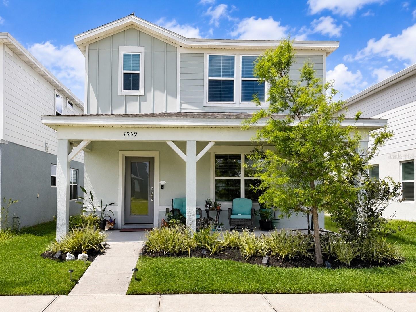 Welcome to this beautifully maintained Pulte-built bungalow in the highly desirable Tohoqua community. Built in 2023, this move-in ready home offers 2,072 square feet of thoughtfully designed living space featuring 3 bedrooms, 2.5 bathrooms, a spacious loft, and a rear-entry 2-car garage.
A charming covered front porch welcomes you into a bright and inviting open-concept floor plan designed for both comfortable everyday living and effortless entertaining. The main level features tile flooring throughout the living areas, abundant natural light, and seamless flow between the living room, dining area, and kitchen.
The kitchen serves as the heart of the home, showcasing white shaker cabinetry, quartz countertops, stainless steel appliances, a large center island with seating, stylish pendant lighting, and ample storage space. All kitchen appliances, along with the washer and dryer, are included for the new owner.
Upstairs, an oversized loft provides flexible space ideal for a second living area, media room, home office, fitness area, or playroom. The spacious primary suite features a large walk-in closet and a private ensuite bathroom with dual vanities and quartz countertops. Two additional bedrooms share a full bathroom, while a convenient half bath is located on the first floor for guests.
Additional highlights include ceiling fans, window blinds throughout, Ring doorbell, tile flooring throughout the main living areas, well-maintained carpeting upstairs and on the staircase, and a rear-entry 2-car garage with additional driveway parking for two more vehicles.
Perfectly positioned facing a beautifully landscaped green space with sidewalks and pedestrian-friendly walkways, this home offers a peaceful setting without direct traffic immediately in front of the property, creating a more private and welcoming environment.
Residents of Tohoqua enjoy outstanding community amenities, including multiple resort-style swimming pools, cabanas, a recently opened clubhouse and pool area, tennis courts, passive parks, playgrounds, walking trails, and beautifully maintained common areas designed to promote an active and connected lifestyle.
Conveniently located near schools, shopping, dining, and everyday conveniences, this exceptional home combines modern construction, functional living spaces, and outstanding value in one of Osceola County’s most sought-after newer communities.