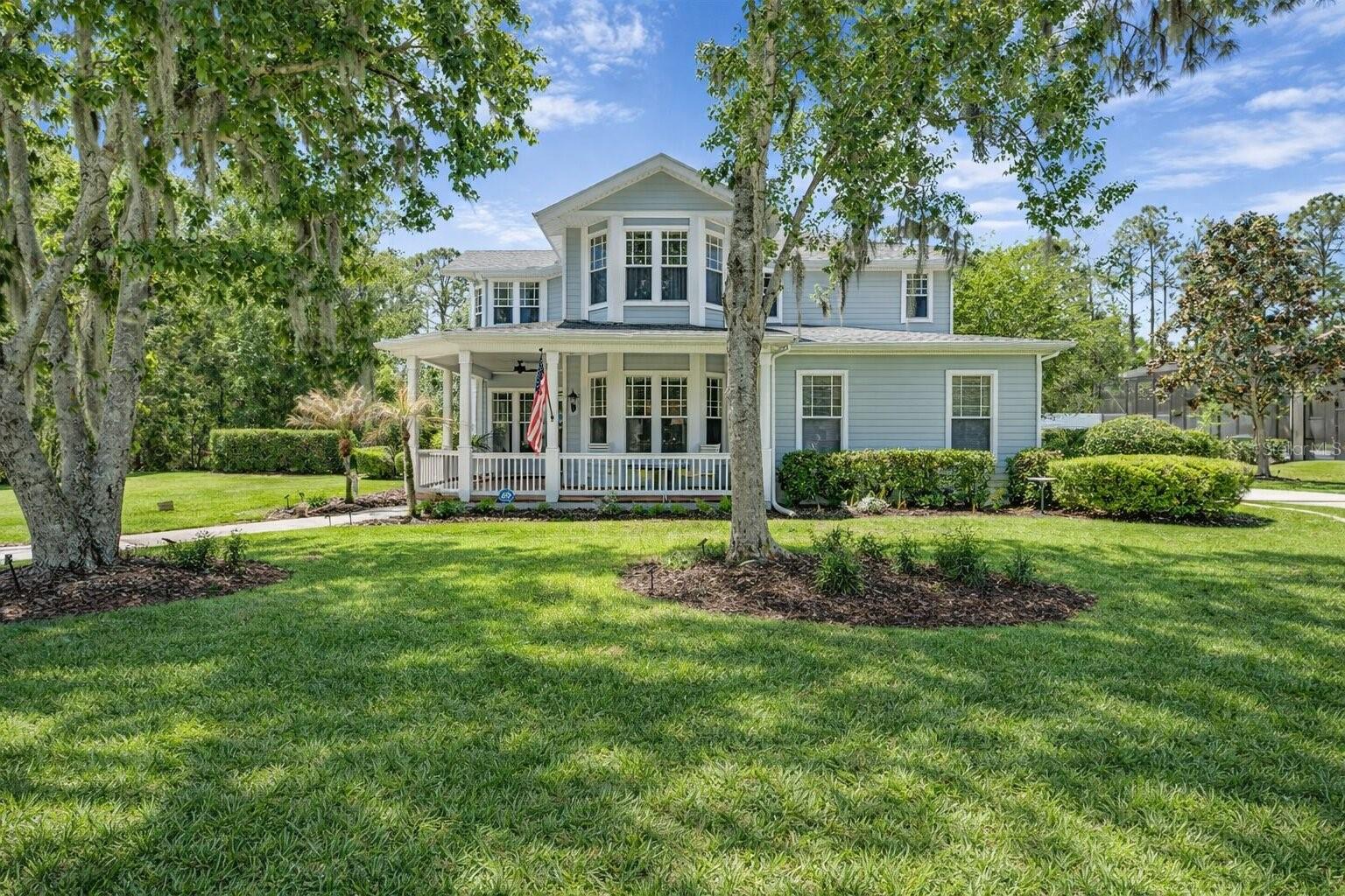 Tucked behind the guarded gates of Fish Hawk Trails on just under an acre of private, beautifully landscaped grounds, this Key West-inspired craftsman estate is a rare listing that delivers on every promise. The wraparound brick-paved front porch sets an immediate tone, unhurried, gracious, & architecturally distinct. Whether you're starting the morning with coffee or unwinding at dusk, this is a home that invites you to slow down from the moment you arrive. Inside, ¾-inch solid hardwood floors flow seamlessly across the entire first level, grounding a thoughtfully designed floor plan that balances formal elegance with genuine livability. A front study with built-in bookshelves offers a quiet retreat, while the formal dining room framed by beautiful bay windows is sized & positioned for the full art of entertaining. The family room & chef's kitchen form the heart of the home, where a gas cooktop, built-in wall oven with convection & air fryer capability, vented hood, granite countertops, soft-close cabinetry, & a refrigerator with a built-in wine chilling feature come together in a space that's as functional as it is beautiful. A custom mantle crowns the wood-burning fireplace, adding a finished, designer touch to the family room, & an abundance of windows keeps the entire first floor bathed in natural light with stunning views of the pool & private backyard beyond. Built-in wired speakers in the family room set the stage for effortless entertaining, carrying seamlessly out to the pool patio where a second set of built-in wired speakers complete the experience. Upstairs, the primary suite is a true sanctuary with newly replaced windows installed in Jan 2026, equipped with child safety latches for added peace of mind, his-and-hers walk-in closets, & a fully remodeled ensuite bath (2024) featuring dual vanities, a soaking tub, & a separate shower. Each secondary bedroom offers generous proportions & walk-in closet storage, with the fourth bedroom enjoying the added privacy of its own ensuite bath. Step outside & the backyard delivers the kind of outdoor living that makes Florida worth it. A sparkling pool with water features, expansive paved decking, & lush landscaping sit within a fully fenced yard that backs to total privacy. No rear neighbors. No side neighbors. Just your own private oasis. This home has been thoughtfully updated over the years, including a new roof (2021), a new first floor HVAC (2022), a fully remodeled primary bath (2024), secondary baths refreshed with quartzite counters & new fixtures, fresh paint throughout, & a whole-home water softener system. The current owners have invested significantly in making this home truly move-in ready, adding a brand new second floor HVAC (June 2025), all new first-floor light fixtures & fans, a new light fixture & fan in the primary suite, & a beautifully remodeled laundry room complete with a new washer & dryer, an added utility sink, extra storage, & a dedicated hanging area, a practical luxury that's harder to find than it should be. Living in Fish Hawk Trails means access to over five miles of walking & biking trails, tennis & basketball courts, a private clubhouse, & playgrounds, all within one of the Tampa Bay area's most sought-after guard-gated communities, zoned for top-rated schools & minutes from shopping, dining, & golf. Homes with this combination of character, privacy, acreage, & updates don't come available often. This is the one you've been waiting for.
