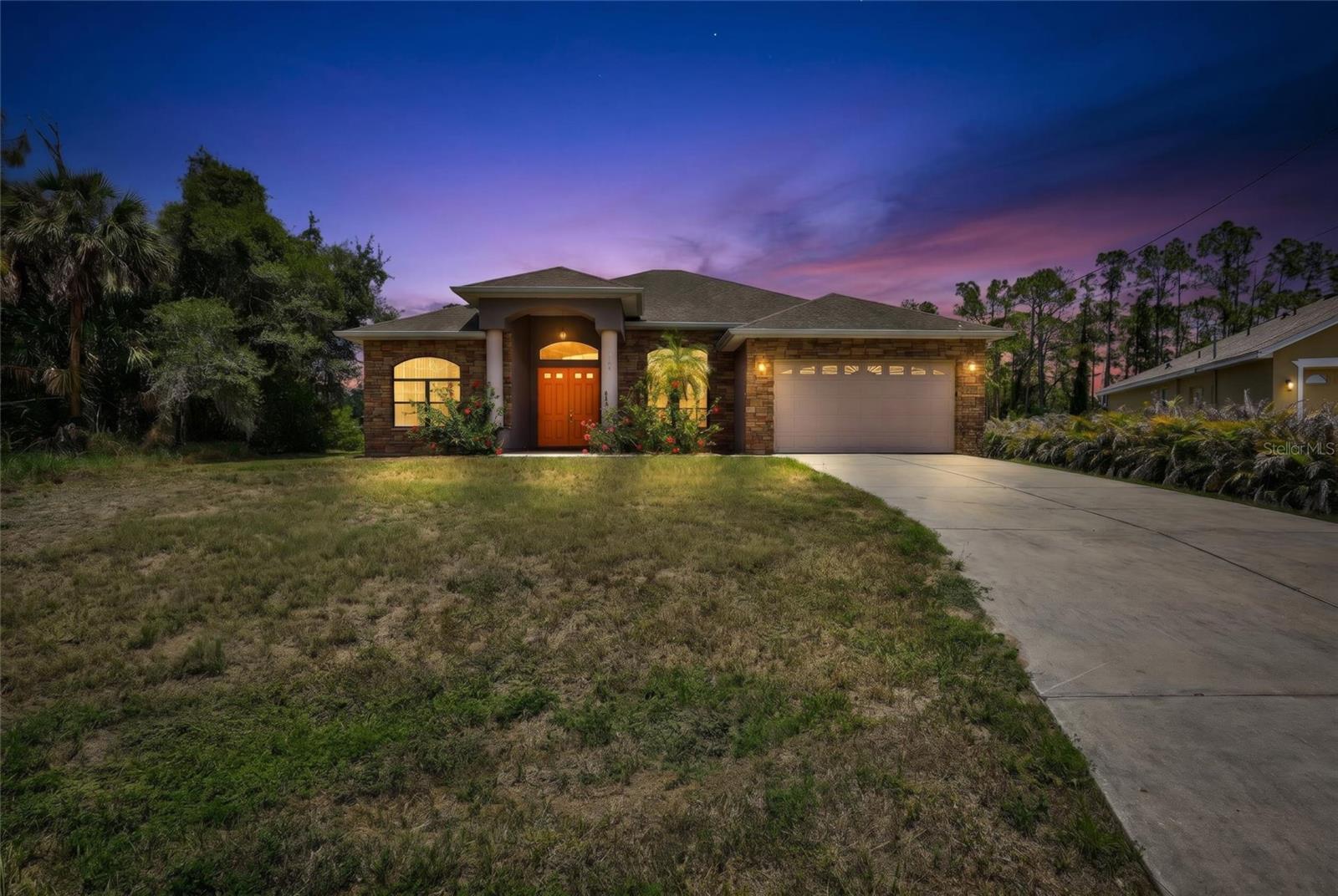 Welcome to 3284 Newmark Street, a spacious and inviting retreat offering the perfect blend of comfort, privacy, and Florida living. Nestled on a rare oversized 0.42-acre lot backing up to a serene greenbelt, this beautifully maintained residence features over 2,100 square feet of thoughtfully designed living space filled with natural light and soaring ceilings.
From the moment you arrive, the home’s charming curb appeal and stone-accented exterior create a warm and welcoming first impression. Inside, the open-concept layout provides generous living and entertaining spaces, while the split-bedroom floor plan offers privacy and functionality for both family and guests.
The expansive backyard offers endless opportunities to create your dream outdoor oasis — whether that means adding a pool, outdoor kitchen, garden, or simply enjoying the peaceful surroundings and extra space rarely found at this price point.
Conveniently located near shopping, dining, parks, golf courses, and the Gulf Coast’s world-renowned beaches, this home delivers both tranquility and accessibility. Whether you are searching for a primary residence, seasonal retreat, or investment opportunity, 3284 Newmark Street is a property you will not want to miss. 
Seller is offering a lease-to-own option for qualified parties seeking a rental opportunity with the ability to purchase the property at a later date.