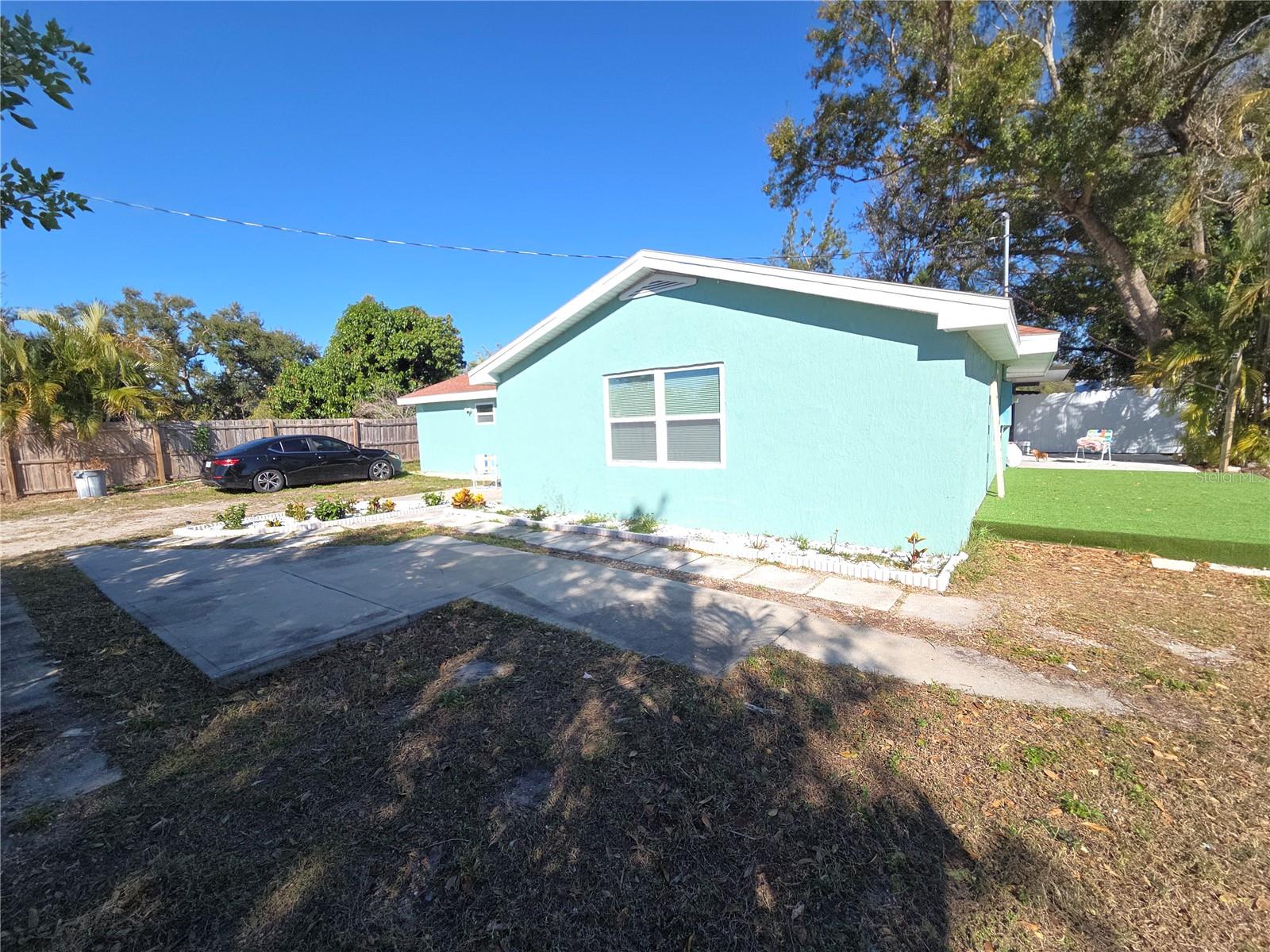 Beautiful!! Completely rehabbed with nice finishes throughout,New Ac and much more ,  this move-in-ready home offers modern updates, quality craftsmanship, and a bright, welcoming interior. Ideally located near top Sarasota schools, shopping, and dining, and just minutes from Siesta Key Beach, this property delivers both comfort and convenience in one of Sarasota’s most desirable areas. The neighborhood features new construction homes selling at significantly higher prices, making this an exceptional value. Enjoy a spacious, fully fenced patio—including the front yard—for absolute privacy, with plenty of room for an RV, multiple vehicles, or a boat. Schedule your showing today and explore the possibilities for yourself.