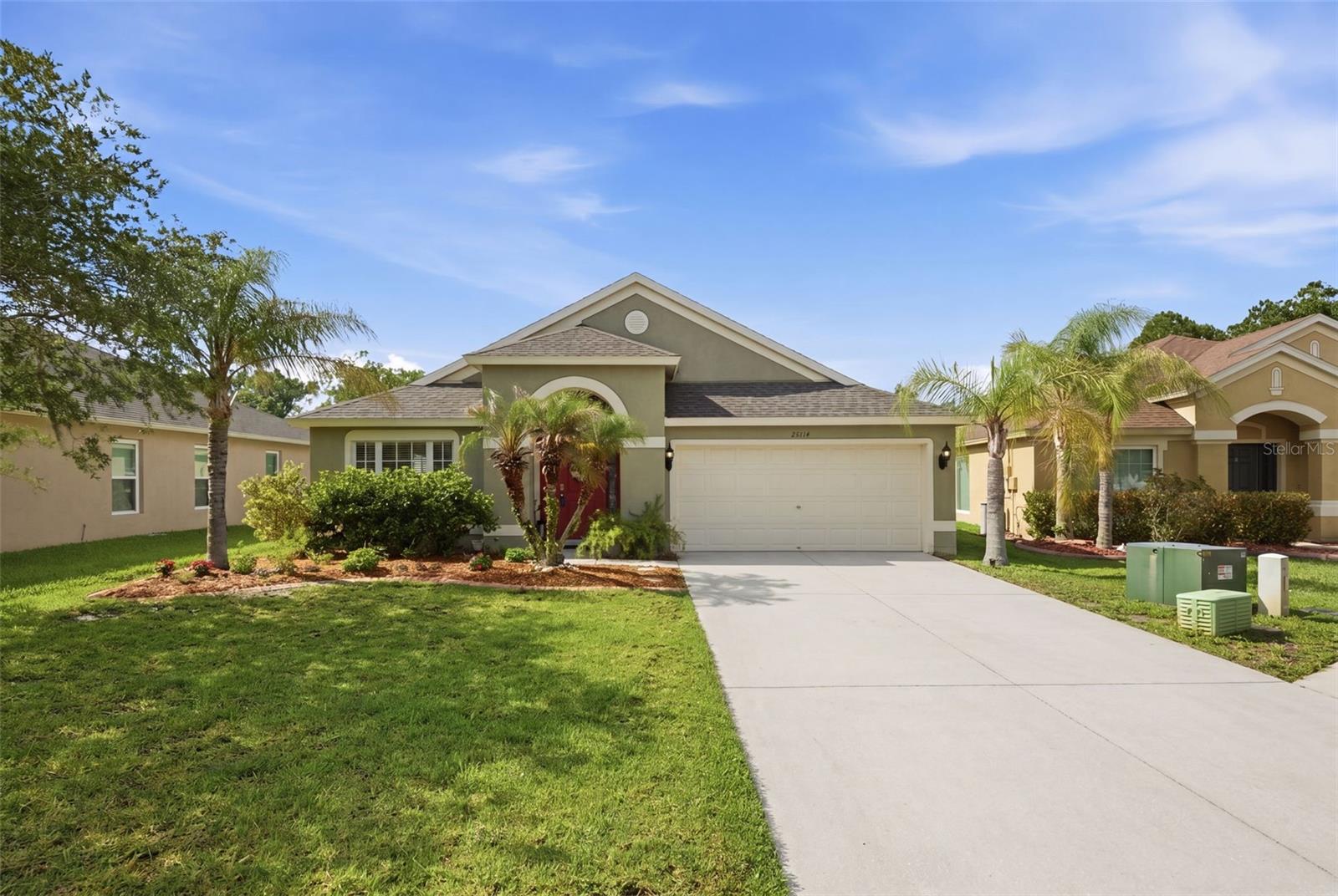 Welcome to the highly desirable Lexington Oaks Golf Community in MAYWOOD Village, where this cozy 4-bedroom, 2-bath, 2-car garage home offers peaceful POND and wooded VIEWS. Featuring tile flooring throughout and granite countertops in the kitchen and both bathrooms, the home blends style and easy maintenance, while the spacious kitchen includes stainless steel appliances, white cabinets, a built-in desk, and an eat-in area that flows into a warm family room with sliding doors leading to a screened lanai. The split floor plan provides privacy, with a generous primary suite showcasing a walk-in closet and spa-like bath with dual sinks, a garden tub, and a walk-in shower. Major updates include a 2023 roof and 2018 A/C, plus an epoxy-coated garage floor for a clean, finished feel. Outside, enjoy the lanai and a fully vinyl-fenced backyard all set against a relaxing natural backdrop. Residents also enjoy resort-style amenities including golf, pools, fitness, sports courts, and dining at Omari's Bar & Grill, all conveniently close to shopping, schools, and everyday essentials—making this home the perfect blend of comfort, location, and lifestyle.