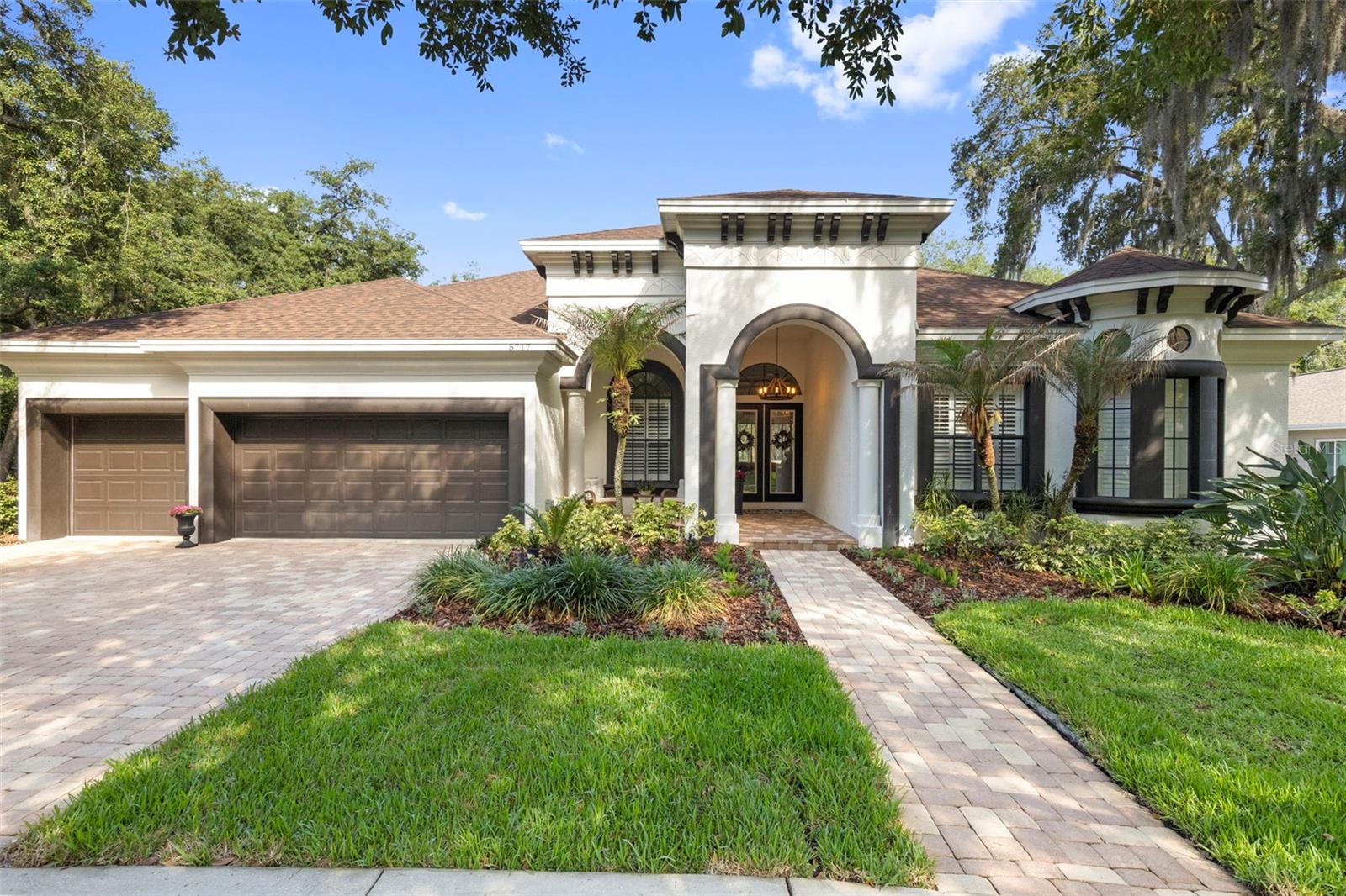 Updated and move-in ready 4/3 home with a 3-car garage on a private .39-acre conservation lot with mature landscaping. Designed for comfortable living, entertaining, and working from home, it features strong curb appeal, a functional layout, and resort style outdoor space. 
Interior highlights include high ceilings, crown molding, coffered and tray ceilings, Brazilian hardwood floors in living areas, tile in kitchen/baths, and carpet in the theater room. The formal living room has pool views and triple sliders opens to lanai. Private office in the front of the house. 

The refreshed chef’s kitchen offers quartz countertops (2022), 42" cabinetry, large island, breakfast bar, walk-in pantry, built-in desk, wall oven, gas cooktop, new refrigerator (2026), dishwasher (2024), and updated lighting (2022). The kitchen overlooks the family room with tray ceilings, gas fireplace, built-ins, and triple sliders that let in natural light and leads out onto the lanai. The spacious primary suite includes a spa-style bath with dual vanities, separate shower, jetted tub and three walk-in closets with amazing custom built-in closet systems that provides smart, floor-to-ceiling vertical storage that maximizes every inch of space. Three additional bedrooms are well-sized with walk in closets and situated on the other side of the house with a split floor plan for privacy. 2 bedrooms share a Jack and Jill bath. 

For entertaining, a screened outdoor patio includes a saltwater pool with waterfall, solar panels, new LED pool light (2026), and a paver patio with fire pit outside screened by lush landscaping to provide for privacy. Inside enjoy a custom-built home theatre (2020) with a new receiver (2026) and universal remote (2026) that conveys for new owners to enjoy. Recent updates: New roof (2025), 4-ton HVAC (2024), side entry door to garage (2026), water softener (2026), whole-house carbon filter (2026), toilets (2021). 

Perfectly located in FishHawk Ranch and walkable to all top-rated zoned schools, shops, town square and resort style community amenities that include trails, clubhouse, pool, sports courts, gym, and parks. Convenient access to highways, beaches, shopping, dining, and attractions. OWNER/AGENT