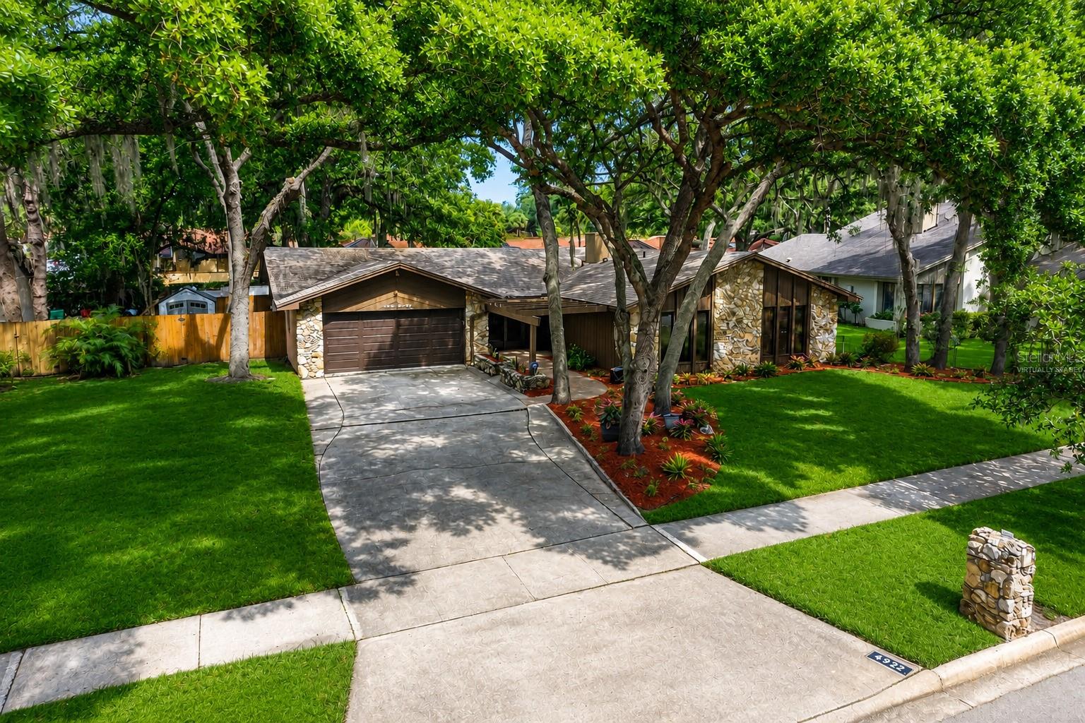 One or more photo(s) has been virtually staged. Welcome to this beautiful Orlando pool home, where comfort, convenience, and Florida living come together. Situated on a generous .25 acre lot in a well-established neighborhood with no HOA, this inviting residence offers the perfect combination of privacy, functionality, and accessibility, making it an excellent opportunity for first-time homebuyers, growing families, or investors.

Step inside and discover spacious living areas designed for both everyday comfort and effortless entertaining. The functional layout provides ample room to relax and enjoy time with family and friends. The home features a separate living room, formal dining room, and inviting family room, offering flexibility for both casual living and formal gatherings. The family room is highlighted by a cozy wood-burning fireplace and sliding glass doors leading to the oversized covered porch, creating a seamless connection between indoor and outdoor living.

The updated kitchen features granite countertops, newer stainless steel appliances, and a separate dinette area with French doors leading to the porch, making it the perfect space to enjoy your morning coffee while overlooking the backyard. All appliances convey, including the washer and dryer. The spacious laundry room includes a utility sink and built-in cabinetry for additional storage.

The private primary suite offers its own sliding glass doors leading to the porch, providing easy access to the outdoor living space. The primary bathroom features a separate vanity area, dual sinks, a walk-in closet, and an enclosed glass shower, creating a comfortable retreat at the end of the day.

Additional features include laminate flooring throughout, new windows, a roof approximately 8 years old, A/C approximately 9 years old, and a water heater approximately 5 years old, offering added peace of mind.

Step outside and enjoy your private backyard oasis featuring a sparkling saltwater pool and a fully fenced yard, where the outdoor space offers endless possibilities for family gatherings, weekend barbecues, gardening, or simply enjoying Florida's year-round sunshine. One of the home's standout features is the impressive 9' x 44' covered porch, providing an abundance of outdoor living space and the potential to be enclosed for additional interior living area, a game room, home office, or Florida room.

Conveniently located with easy access to major highways and roadways, commuting throughout Central Florida is a breeze. You'll be just minutes from shopping, dining, entertainment, schools, healthcare facilities, parks, and recreational opportunities.

Whether you're looking for a place to call home or a property with excellent long-term value, this home offers the lifestyle you've been searching for. With its desirable location, thoughtful updates, spacious floor plan, and welcoming atmosphere, this is a wonderful opportunity you won't want to miss.

Schedule your private showing today and experience everything this Orlando gem has to offer!