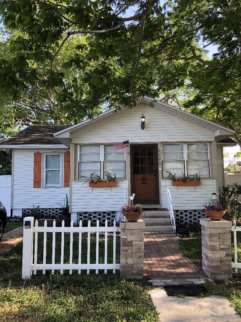 If you're looking for a home with personality and real character, you'll fall in love with the “Historical Cottage.” It's truly a blend of the old, the new, unique & original design elements, a fabulous location and a wonderful neighborhood! Each day you'll be greeted by a traditional picket fence, a red brick paver sidewalk, decorative shutters, and home-made flower boxes!
Although newly renovated, the original polished wood floors, doors, woodwork and mid-century craftsmanship have been maintained. Outdoors, the Cottage features a large, fenced backyard with gated alley access and is complete with a storage shed, a huge three-level wood deck, a brick fireplace and grill for all your entertaining and everyday pleasure!  Nature lovers will appreciate the magnificent and exotic Guanacaste Trees that adorn the property and provide beauty and shade all year around.
The Cottage has been totally upgraded with all the modern amenities including high end granite counter tops, decorator cabinetry, upgraded bathrooms, a bright and airy tiled Florida Room, an eat-in kitchen nook overlooking the outdoor deck and “retro” design elements throughout the Cottage. All NEW appliances, water heater, plus microwave, dishwasher and washer/dryer are included! 
NO HOA AND NO FLOOD ZONE!
Located just steps from the booming Downtown Main Street, the Cottage is a LIFESTYLE....not just a home. The comfortable feel of a small-town community with its “old school” atmosphere blends with the unique and modern urban conveniences of Main Street which include gourmet restaurants, sidewalk cafes, antique shops, organic markets, pubs, microbreweries, live entertainment, The Aquatic Center, Town Hall & The Library.
Everything the “Downtown” has to give is walking distance from the Cottage. In addition, the city welcomes the use of golf carts which makes touring the magnificent parks and riverside attractions special events! The Downtown area boasts four square miles of parks for groups and pets! The famous and picturesque Sims Park on the Cotee River is a favorite and features a free boat ramp, kayak rental, sparkling fountains, festivals and fairs throughout the year and the chance to watch playful local inhabitants such as Dolphins and Manatees. Available immediately.   The Cottage is family-owned by local residents.