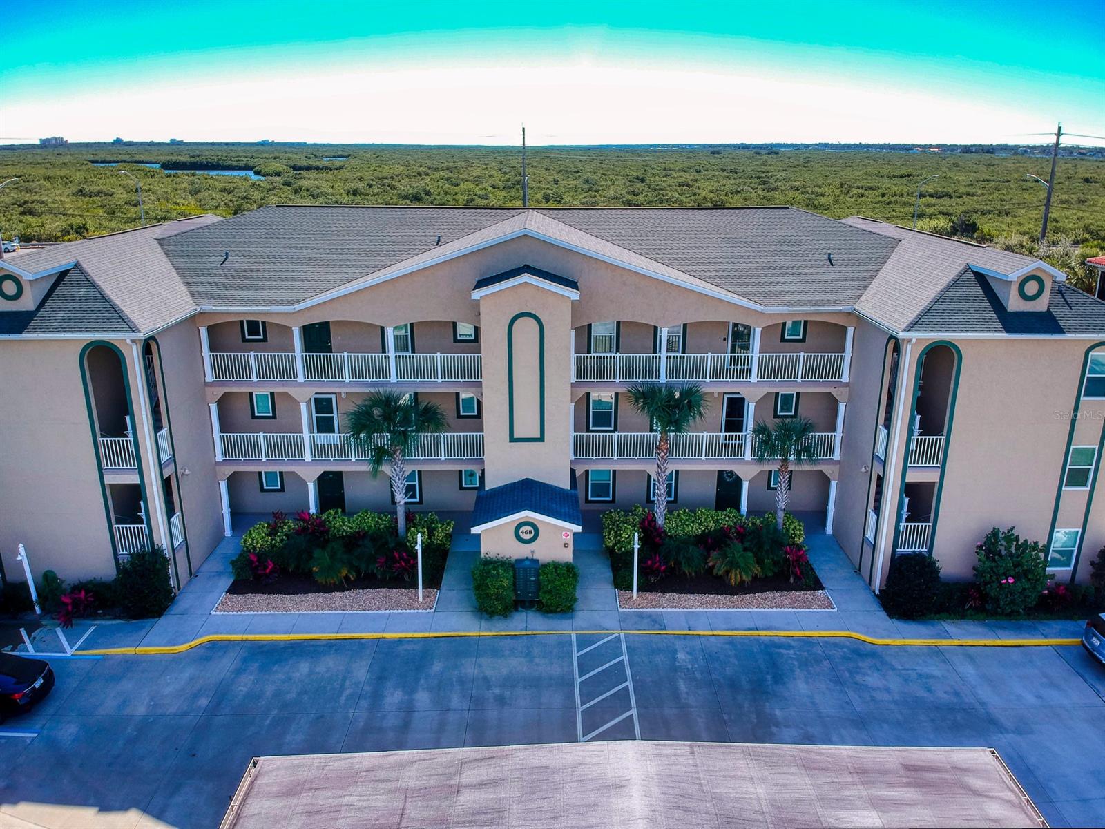 BEAUTIFUL RIVERFRONT COMMUNITY  Enjoy the good life in this ground floor, Bouchelle Island condo, located in Bouchelle's newest building. Situated less than a mile from New Smyrna's famous beaches, and right on the Inter Coastal Waterway. Bring your boat, kayak, bike, and tennis racquet! Or just your towel and suntan lotion; this like new 2BR/2BA condo is ready for anything. Just a few blocks from some of New Smyrna's best dining, and historic Flagler Avenue's pubs and shops. Bouchelle Island offers two heated swimming pools, tennis courts, fishing pier, a clubhouse and weight room, a pitch and putt golf course, and over 1/2 miles of riverside boardwalk. Moor your boat in one of Bouchelle's slips, or park it in the dry lot and launch it from your private boat ramp. Sunset walks along the boardwalk will thrill you with dolphin and manatee sightings, great birding opportunities, and with an endless stream of interesting watercraft going by. Enjoy the sunshine from your large, screened-in private balcony as you plan your day. This is a great place to live full time, or as your vacation getaway. Don't let this gem get away! ;LocationDescription: Condo ;Water: City