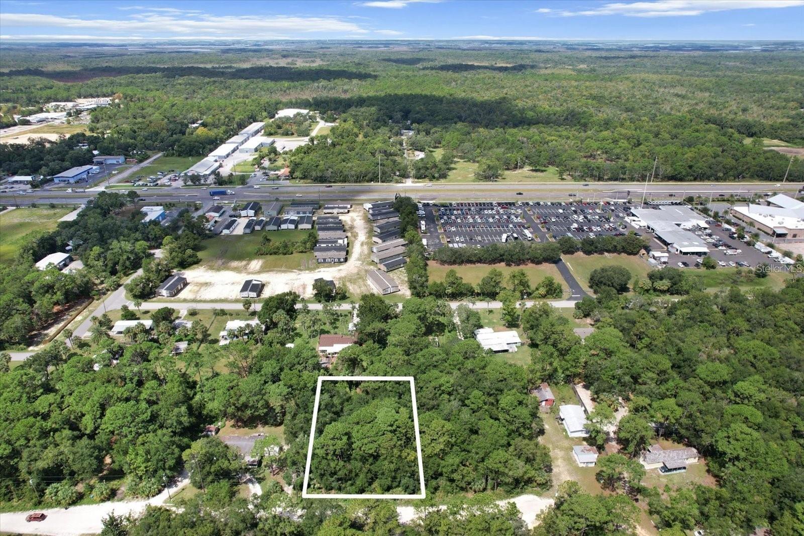 Tucked away in the heart of Florida’s Nature Coast, this .57-acre property in Homosassa offers something you don’t often find—two legally distinct lots bundled into one rare opportunity. With a total of 24,950 square feet, you have the freedom to build two separate residences or design a single estate with room to spread out. Located on a paved road with electricity available, the site is ready for your vision, whether it’s a charming manufactured home, a custom single-family residence, or an investment project that can grow with you.

Living in Homosassa means trading traffic for tranquility without sacrificing convenience. Just minutes away, you’ll find locally owned restaurants serving fresh seafood, unique shops to explore, and all the essentials you need for everyday living. Beyond that, Florida’s natural beauty is quite literally at your doorstep. The Homosassa River winds just a few miles away, offering world-class fishing, boating, and manatee sightings, while Homosassa Springs State Park showcases bald eagles, herons, and the wildlife that makes this area so special.

Whether you envision a peaceful retreat shaded by old Florida oaks or a full-time home base close to everything, this property sets the stage. Versatile, well-located, and surrounded by nature, it’s an investment in both your future and the lifestyle only Homosassa can provide.