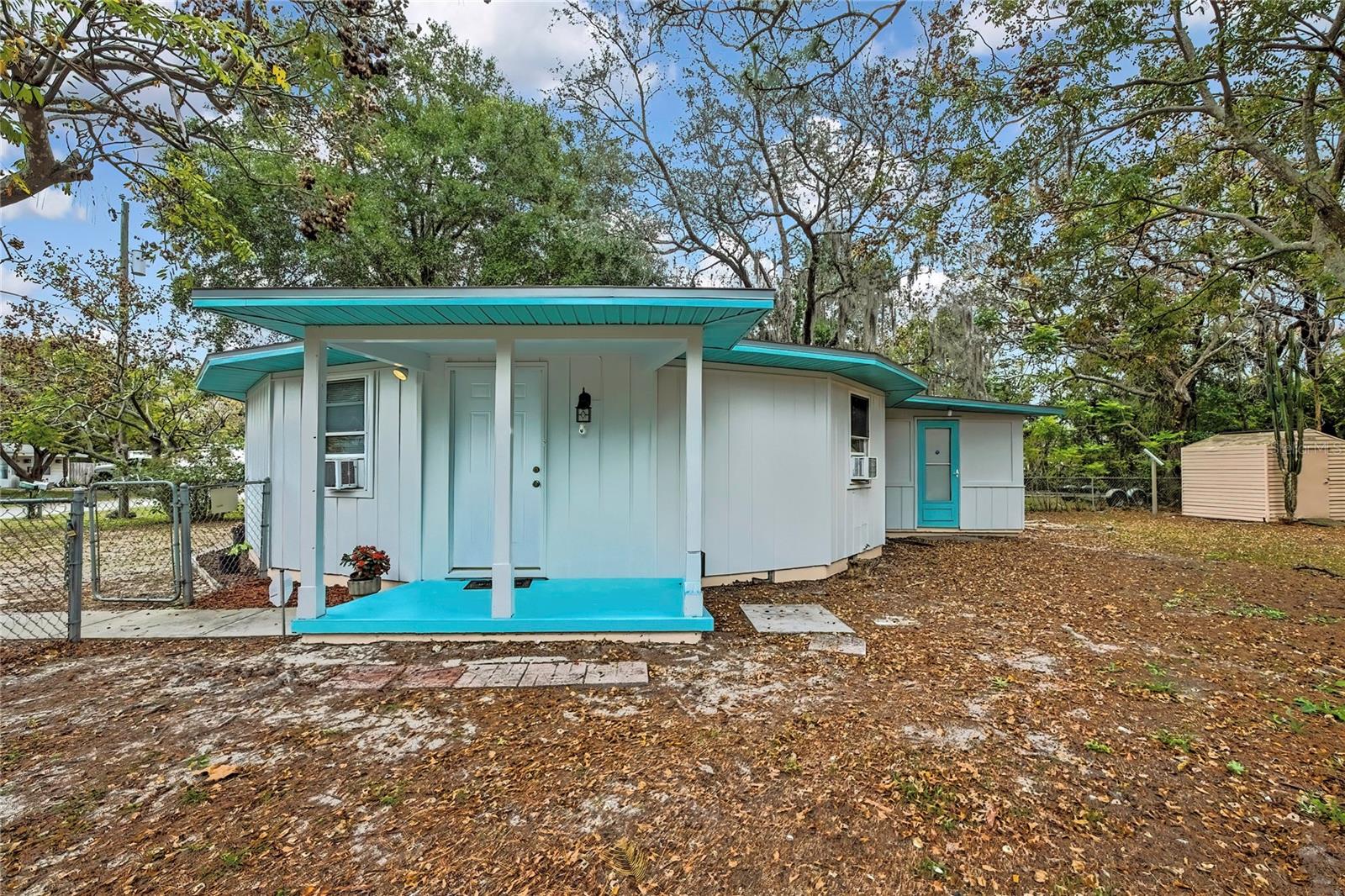 One or more photo(s) has been virtually staged. **MOTIVATED SELLER**  **MOVE-IN READY**   **STORE YOUR BOAT, RV, JET SKIES** ** EXCELLENT FOR RENTAL OR AirBNB**
Step into something truly unique with this charming round home located in the heart of Hudson! Once inside you immediately feel the charm.  Make this home your own. This well-maintained two-bedroom, one-bath residence sits on an oversized lot with plenty of space to store your boat, RV, recreational toys, or create the outdoor oasis you've always wanted.  Designed for comfortable living and entertaining, the fully fenced yard offers privacy, functionality, and plenty of room for family gatherings, pets, and outdoor enjoyment. Inside, you'll find tile flooring, fresh interior and exterior paint, including a brand-new roof installed in 2025 and a water purification system less than two years old.  
The inviting lanai provides versatile flex space perfect for a home office, fitness area, hobby room, or relaxing retreat. A convenient storage shed adds additional room for lawn equipment, tools, and extra storage needs. Adding even more value, the septic system replaced in January 2026. With its distinctive character, oversized property, and endless possibilities to personalize.  Located approximately 3 miles from Bayonet Hospital, also, nearby are resturants, and shopping. Weeki Wachee Springs less than an hour away. This one-of-a-kind home is an incredible opportunity at under $175K.  Schedule your private showing today and experience the charm of round-home living for yourself!  BEST DEAL IN TOWN!!!!