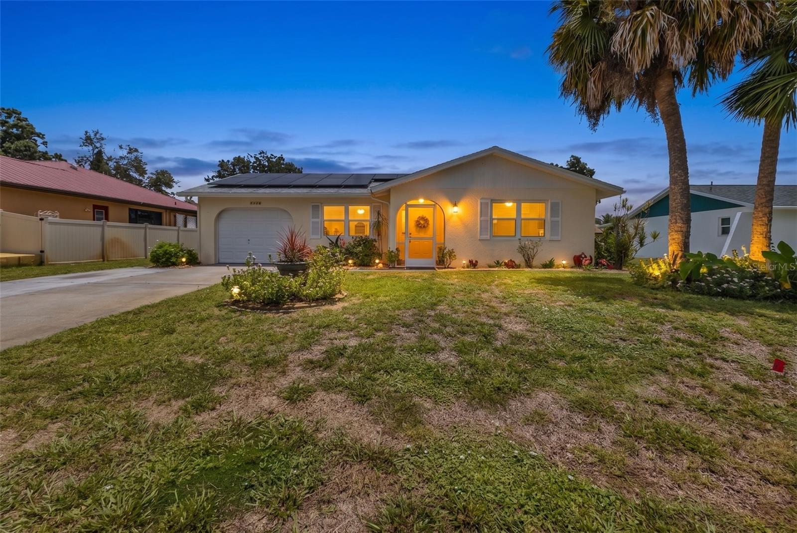Charming, Updated, and Move-In Ready! This beautifully maintained 2-bedroom, 2-bath home with a 1-car garage is a must-see! Don't judge this home by a drive-by—it gives an impressive list of upgrades and features designed for comfort, efficiency, and peace of mind.
The home features a metal roof installed in 2023, owned solar panels installed in 2021 (free and clear), and underground electrical service, helping keep the average electric bill to approximately $57/month. Even better, the solar panel warranty is transferable to the new owners.
Inside, you'll find a bright, open floor plan with a beautifully updated kitchen featuring newer appliances, granite countertops, and a spacious dining area that flows seamlessly into the large family room, creating the perfect space for everyday living and entertaining. The air-conditioned family room is included in the home's total living area, providing additional comfortable living space. Both bathrooms have been tastefully updated with granite countertops and stylish LED anti-fog mirrors.
Additional improvements include hurricane-impact windows and exterior doors installed in 2017, a new HVAC system in 2023, and a water heater replaced in 2019. The 18' x 10' covered screened lanai, added in 2013, offers the perfect setting for entertaining, relaxing, or enjoying Florida's beautiful weather year-round.
Step outside to the adjoining concrete patio, ideal for barbecues and outdoor gatherings, overlooking a peaceful backyard complete with mature fruit trees and a storage shed for added convenience.
Conveniently located near shopping, restaurants, Port Charlotte Beach Park, public boat ramps, fishing piers, golf courses, tennis and pickleball courts, this home puts the best of Southwest Florida recreation right at your fingertips. Punta Gorda Airport, served by Allegiant Air, is just minutes away, while Sarasota-Bradenton International Airport and Southwest Florida International Airport (Fort Myers) are approximately 45 minutes away.
Whether you're looking for a year-round residence, seasonal retreat, or investment property, this move-in-ready home offers exceptional value, modern upgrades, and the relaxed Florida lifestyle you've been dreaming of.