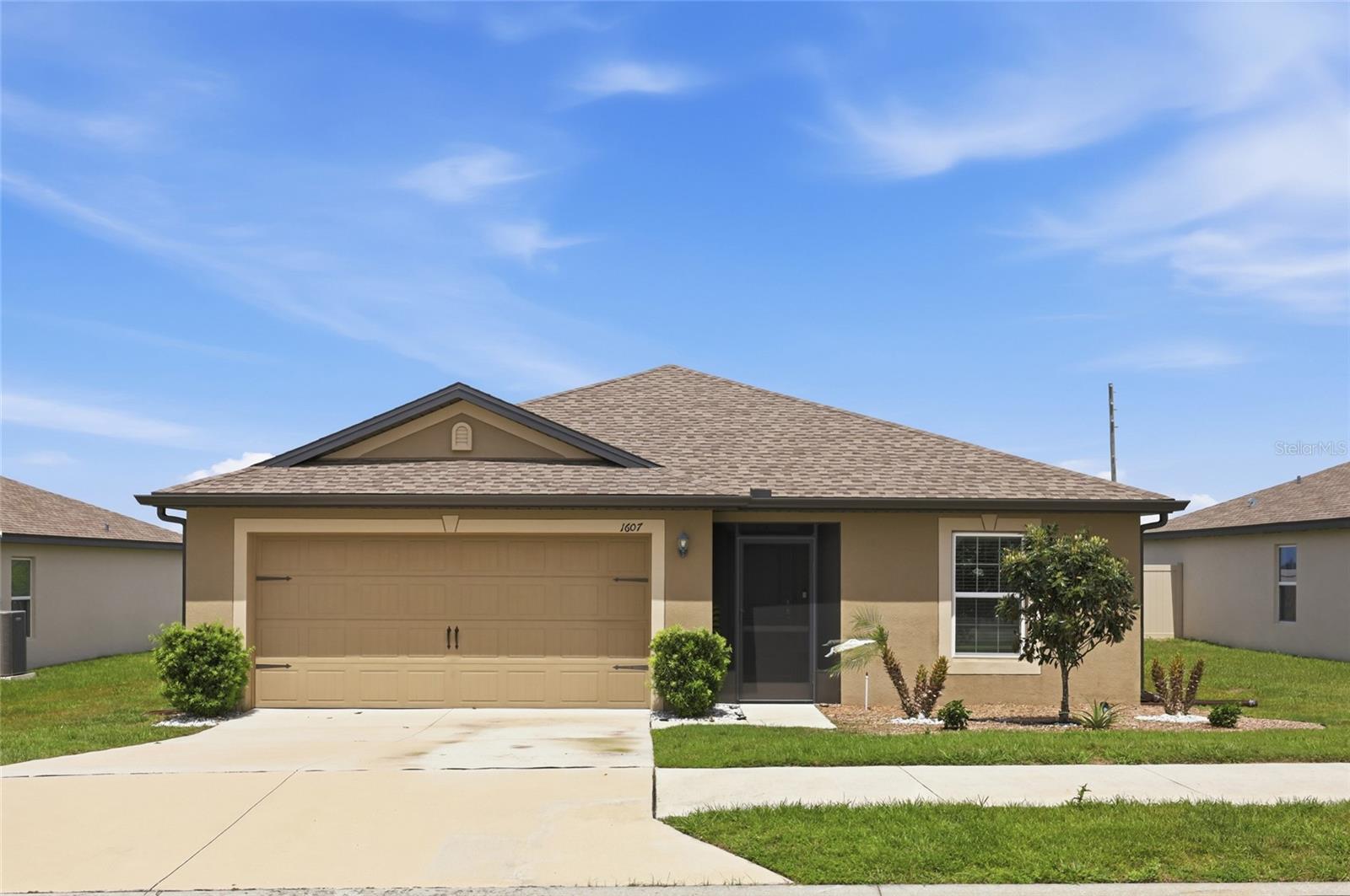 Welcome to 1607 Swan Lake Circle. 

This beautifully maintained 3-bedroom, 2-bathroom home offers the perfect blend of comfort and style. Nestled in a peaceful, well-established neighborhood, this property boasts over 1,300 square feet of living space, ideal for those who love to entertain. The open-concept floor plan features a spacious living room with abundant natural light, making it the perfect spot for relaxation or hosting guests. The modern kitchen is equipped with stainless steel appliances, plenty of cabinet space, and an eat in kitchen overlooking the private backyard. The master suite offers a peaceful retreat with a large closet and an en-suite bathroom featuring a walk-in shower and a large vanity with ample counterspace. Two additional well-sized bedrooms provide ample space for family, guests, or a home office. Step outside and enjoy your private fenced backyard featuring a screened lanai and a large outdoor area perfect for gatherings, grilling or quiet evenings under the stars. The two-car garage provides convenience and additional storage. Located just minutes from shopping, dining, schools, and major highways, this home offers both tranquility and easy access to everything you need. Don’t miss out on this opportunity to own a slice of Florida living!