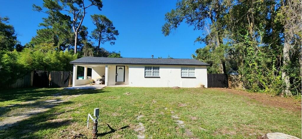 Enjoy all that DeBary has to offer in this charming, fully remodeled 2-bedroom home! Every detail has already been taken care of—simply move in and relax. The open-concept floor plan creates the perfect space for entertaining guests or relaxing after a long day. Featuring a newly renovated kitchen, updated bathroom, and new flooring throughout, no detail has been overlooked. Additional major improvements include a new roof (2023), HVAC system (2022), and septic tank with drainfield (2026), along with new gutters (2026). Centrally located, your new home is minutes from the Sunrail, I-4, shopping, and beaches. Don't let this Gem pass you by!