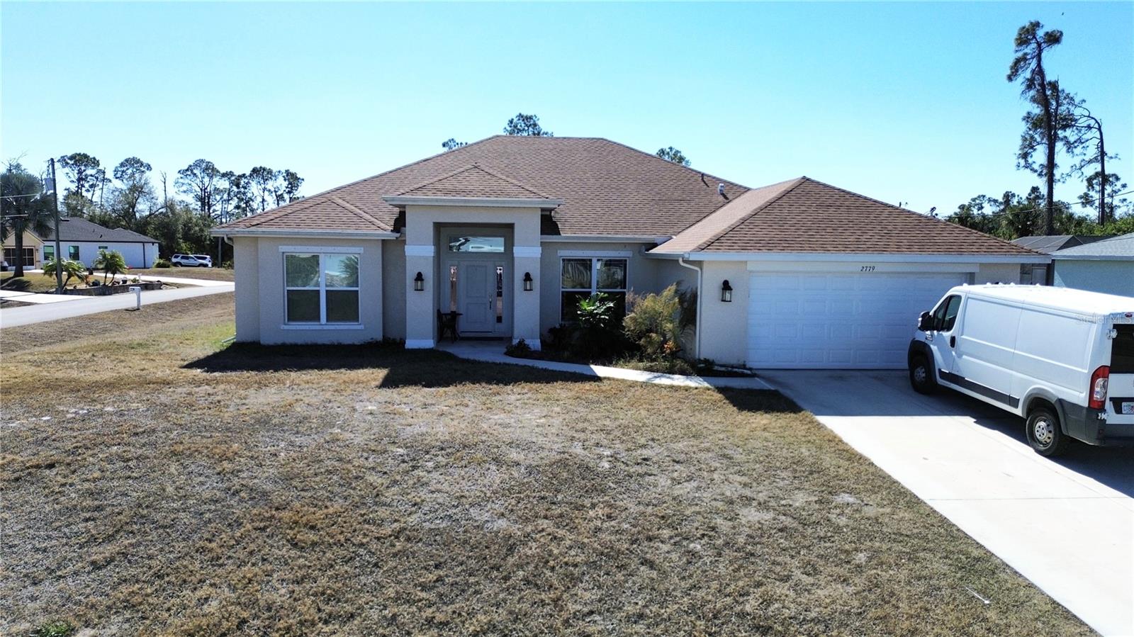 Welcome to 4 BEDROOM/2 BATHROOM HOME WITH A BONUS ROOM/OFFICE ON OVERSIZED LOT IN PRIME LOCATION OF NORTH PORT!!!NO CDD, NO HOA AND NO FLOOD ZONE!!! The home is currently tenant-occupied. The existing lease is in place and expires on February 28, 2026. Tenants are willing to remain in the property after closing. The home features a bright open floor plan with big windows providing an inviting and modern feel as soon as you step inside, which makes it perfect for both entertaining and relaxing. The large living room creates a cozy and inviting atmosphere. At the heart of the home is a stunning gourmet kitchen with countertops, stainless steel appliances, a large center island with seating, and cabinetry provide both beauty and functionality—ideal for everyday living or hosting guests. Adjacent to the kitchen, the spacious dining and living areas create a seamless environment for family gatherings and entertaining. The split-bedroom floor plan ensures privacy and comfort, with primary suite offering a peaceful retreat. It includes a large walk-in closet and a spa-inspired en-suite bathroom with dual vanities, and a walk-in tiled shower. The three additional bedrooms are generously sized and perfect for family, guests, or a home office. Located in a great area with easy access to local amenities and attractions, US 41, beaches, shopping, restaurants, fishing, Warm mineral springs, Cool Today Park, Wellen park, North Port Aquatic Center, and major interstate access nearby, this home truly has it all. Don't miss out on the opportunity to make it yours. Call today for your private showing!
