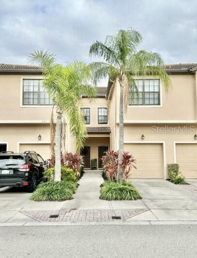 Beautifully maintained NO FLOOD ZONE 2-story townhome located in a quiet, centrally located Sarasota enclave just minutes from Downtown Sarasota and Siesta Key Beach. Enjoy peaceful lake views from the screened-in lanai—perfect for morning coffee or relaxing evenings. This spacious home offers 1,776 sq ft with an open floor plan, high ceilings, decorative trim, and brand-new laminate flooring on the main level. The kitchen features solid wood cabinetry, hard-surface countertops, stainless steel appliances (stove and microwave recently replaced), eat-in space, and a functional layout ideal for everyday living and entertaining.
Upstairs offers comfortable bedrooms with walk-in closets and well-appointed bathrooms, including both a walk-in shower and bathtub. Washer and dryer included. Additional highlights include a private 1-car garage, separate parking space, and neutral décor throughout.
Low monthly fees cover lawn maintenance, insurance, cable, gated access, and professional management. Pet-friendly community allowing up to two large pets. Conveniently located next to Urfer Park with walking trails and just minutes to I-75, Doctors Hospital, shopping, dining, and beaches. Meticulously maintained and move-in ready.  Schedule your private showing today.
