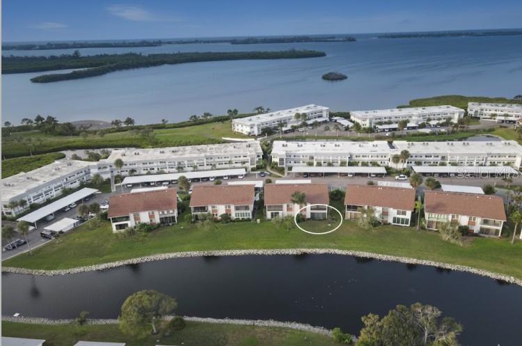 Excellent New Price for this Waterview Lakehouse!!  Enjoy effortless first-floor Florida living just miles from the sugar-sand beaches of Anna Maria Island in the highly sought-after, Bayfront Mount Vernon community.  
This first-floor residence provides easy single-level living and features tile flooring throughout with crown molding, creating a clean, cohesive look with timeless appeal. Both bathrooms have been tastefully remodeled with updated sinks, modern lighting, quartz countertops, new faucets, mirrors, shelving, and toilets, delivering a fresh, spa-like feel.   
The spacious great room is filled with natural light, offering peaceful lake views and a flexible layout ideal for both comfortable daily living and entertaining. The great room easily accommodates a full seating area and dining space and opens seamlessly to the enclosed lanai, creating a relaxed indoor-outdoor flow..  The kitchen is designed for both functionality and style with updated wood cabinetry, a convenient breakfast bar, 2021 appliances, a large pantry, and laundry conveniently located under counter for everyday ease and efficiency.  
A standout and rarely available feature of this condo is the large, outdoor locked storage room, ideal for bikes, beach gear, tools, or hobby equipment, an exceptional and highly desirable bonus within the community.
Residents of Mount Vernon enjoy an active, resort-style lifestyle featuring a clubhouse, heated swimming pool, tennis and pickleball courts, shuffleboard, fitness center, walking and biking trails, a kayak launch and storage, a bayfront covered pavilion with grills,  boat slips and boat ramp providing access to the Gulf of America (only $25 one time fee, with availability). The community also offers workshop and hobby rooms along with a variety of social clubs and activities, creating a vibrant and welcoming atmosphere.
This premier 55+ neighborhood offers an ideal blend of convenience, comfort, and resort-style amenities, with outstanding proximity to the region’s most desirable destinations.  Downtown Sarasota,  the beautiful beaches of Longboat Key with world-renowned Lido Key and Siesta Key located all within close proximity, making it easy to enjoy Sarasota’s cultural scene and Gulf Coast beaches.  Sarasota-Bradenton International Airport is also close by.   
Whether you’re seeking a full-time residence or a seasonal retreat, this home offers comfort, convenience, and an exceptional lifestyle in one of Bradenton’s most desirable 55+ communities.  One or more photos is Virtually Staged.  Call for your Showing Today!