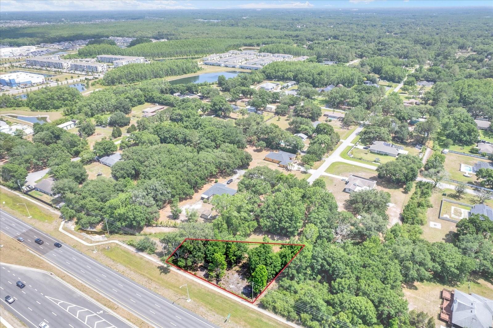 Prime commercial opportunity in the heart of fast-growing Lutz! This 0.42 acre parcel is ideally positioned at the corner of State Road 54 and Meadowbrook Drive, offering excellent visibility, strong traffic counts, and easy access—a perfect setting for a professional office or service-based business.

Zoned 0P01 BPO (Business Professional Office), this property allows for a wide range of office and low-intensity commercial uses, making it a versatile investment for owner-users or developers. The lot is partially cleared, helping reduce initial site prep costs and accelerating your path to development.

Permitted uses under BPO zoning may include:
Medical or dental offices ~ Professional offices (attorneys, accountants, consultants) ~ Real estate or mortgage offices ~ Insurance agencies ~ Financial services firms ~ Title companies ~ Administrative offices ~ Counseling or therapy practices ~ Tech or startup office space.
Located along one of Pasco County’s most active corridors, this site benefits from continued residential growth, expanding infrastructure, and increasing demand for professional services in the surrounding area.
Whether you’re looking to build your own office or develop for investment, this is a rare opportunity to secure a well-located commercial parcel in a high-demand market.

Don’t miss your chance to bring your vision to life on State Road 54!