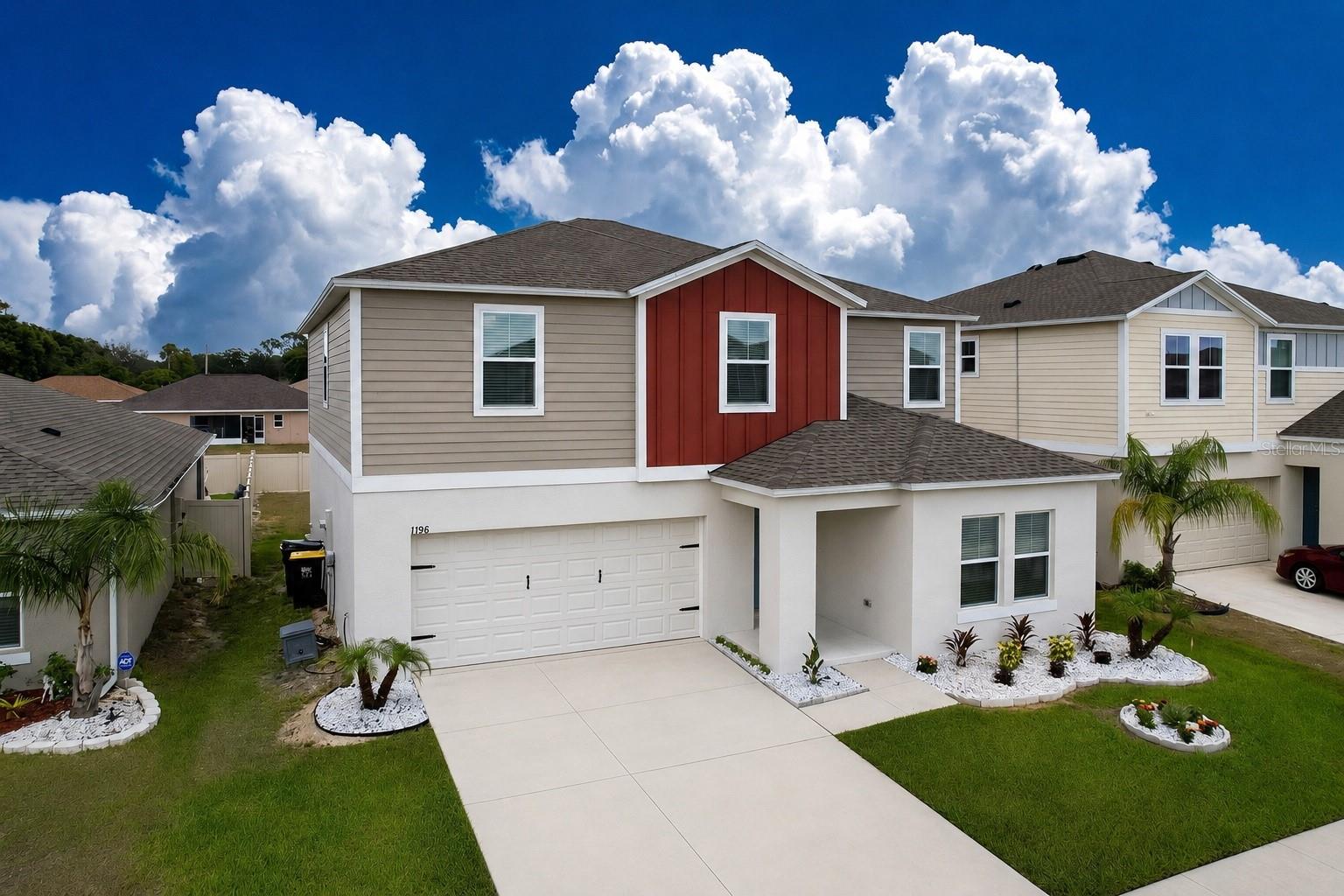 One or more photo(s) has been virtually staged. Welcome to this beautifully updated, 5-bedroom, 3-bath home built in 2022, located in the sought-after Pinnacle Point community of Winter Haven. This home offers a spacious open floor plan filled with natural light and designed for comfortable everyday living.  The kitchen features sleek finishes, modern appliances, and a large island that opens seamlessly to the main living and dining areas, making it ideal for both daily life and entertaining. The downstairs includes a bonus room, a full guest bathroom, and a guest bedroom, adding excellent flexibility for visitors or multi-generational living.  Upstairs, a versatile loft provides additional living space perfect for a media room, office, or play area. The primary suite offers a private retreat with a large walk-in closet and a well-appointed bathroom, while the additional bedrooms provide plenty of space and versatility.  The home features durable vinyl flooring throughout with no carpet,Welcome to this beautifully updated 5-bedroom, 3-bath home in the sought-after Pinnacle Point community of Winter Haven. This home offers a spacious open floor plan filled with natural light and designed for comfortable everyday living. The kitchen features sleek countertops, modern appliances, and a large island that opens seamlessly to the main living and dining areas, making it ideal for both daily life and entertaining. Upstairs, a versatile loft provides additional living space for a media room, office, or play area. The primary suite offers a private retreat with a large walk-in closet and well-appointed bath, while the additional bedrooms provide plenty of space and flexibility. The home features durable vinyl flooring throughout with no carpet, adding to its clean and low-maintenance feel. Step outside to a generously sized backyard, perfect for outdoor gatherings, pets, or relaxing evenings under the Florida sky, with a soon-to-be fully fenced setup adding even more privacy and usability. Located close to LEGOLAND Florida Resort, shopping, dining, and medical facilities, and conveniently positioned between Tampa and Orlando, this home offers both comfort and convenience in a growing Central Florida location.