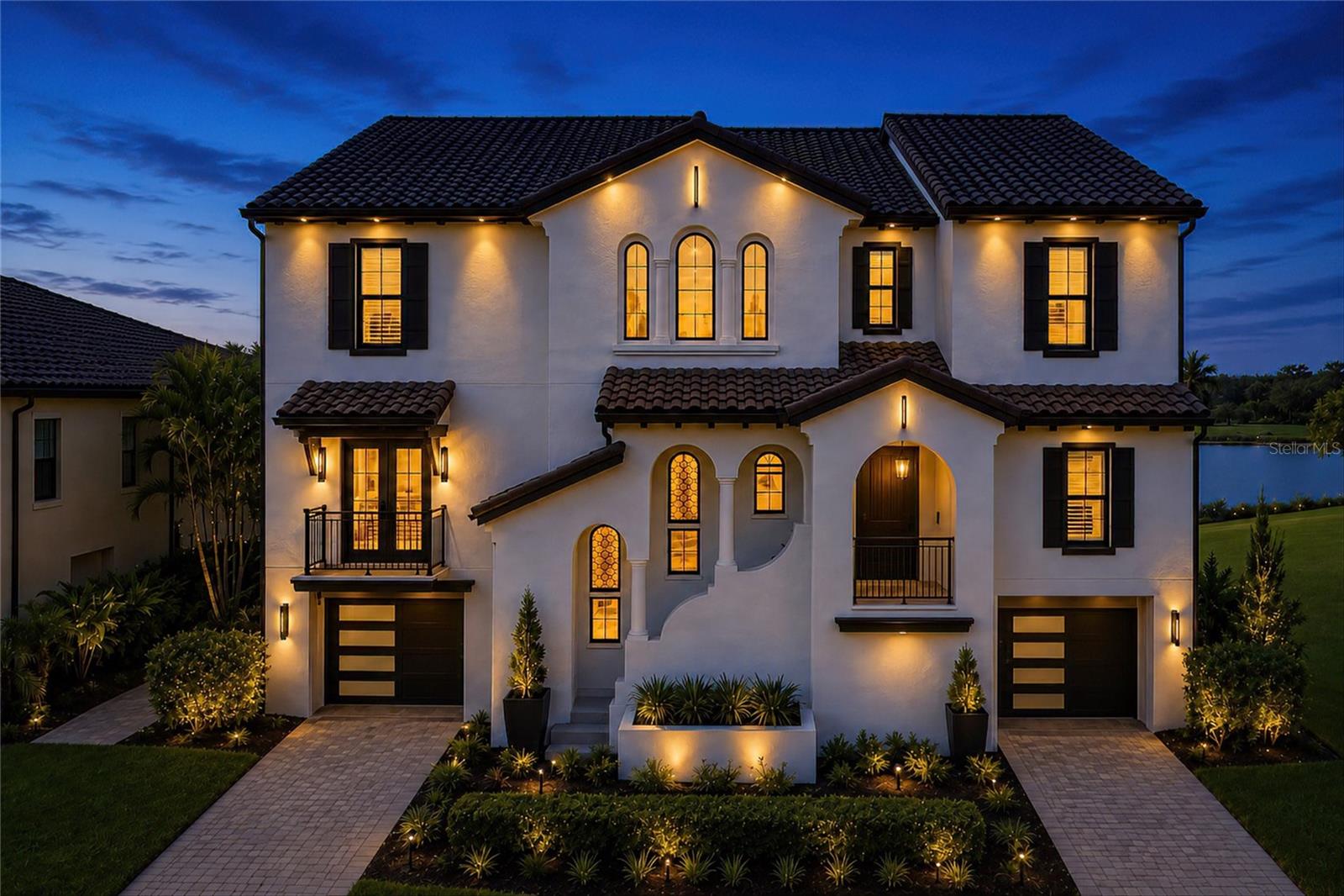 Virtually Staged. Complete mastery of illustrious Florida living is defined in this spellbinding waterfront residence, commanding a sense of presence from the moment of arrival. The Spanish-Mediterranean influences on design and architecture throughout the custom Green Certified Rutenburg home create a fusion of worldly glamour and relaxed comforts against the serene backdrop of Sarasota Bay views. Envisioned for today’s discerning expectations, this home provides an esteemed indoor-outdoor lifestyle that speaks to the host as well as the active family. Nearly 6,000 square feet of enchanting dwelling space is accentuated with stone wall features, wood ceilings and solid beams, arched doorways, Spanish tile flooring, and a wealth of glass that allows natural light. The foyer welcomes you inside to grand interiors that unfold as you transition through the residence. Intimate yet spacious, the living room, featuring a 30’ high ceiling, is open to the gourmet kitchen boasting a bold design of rich wood cabinetry including Sub-Zero French door refrigerator with facades, stunning granite countertops that float up the backsplash behind the gas Wolf stove, stone accent walls, dual dishwashers, Miele coffee bar, and an ample island with bar seating. Juxtaposed to the living room and kitchen for elated events, the 4,000-plus bottle wine room is home to your prized vineyard collection. Three sets of glass double doors showcase a paradise setting on the lanai featuring an outdoor kitchen, outdoor living room with fireplace, and an open-air, fenced pool deck where you can roast marshmallows at the fire pit or relax in the spa. Friends and family will relish making memories in the game room, media room, and private guest wing. Everyone has a personal domain with five gracious guest bedrooms while you find solitude in the romantic owner’s suite featuring a private screened balcony with fireplace, sitting room, marvelous walk-in customized closet and dreamy en-suite bath with freestanding tub and walk-in shower. Dual laundry rooms, new ADT alarm system, partial-home generator, water softener system, and an incredible 10-car garage with a Tesla charging station continue the list of significant amenities and features. Located in Legends Bay, you will appreciate the proximity to IMG Academy, an observation pier and golf course within a short golf cart ride, as well as close distance to beaches and downtown city areas and attractions. Seller made following improvements – 2022 16 SEER HVAC systems with Halo LEDs, new recess lighting throughout, new plantation shutters, updated irrigation system, new outdoor lighting, updated internet and Sono system, misc updated plumbing fixtures.