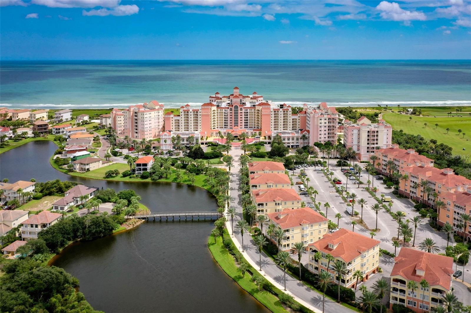 Experience luxury coastal living at its finest in this beautifully updated 3-bedroom, 3-bath condominium located within the exclusive Hammock Beach Resort. Perched on the coveted 10th-floor penthouse level, this exceptional residence offers breathtaking southeastern ocean and golf course views and a spacious balcony where you can enjoy spectacular sunrises and the soothing sounds of the Atlantic Ocean.

A TRULY EXCEPTIONAL FEATURE OF THIS OFFERING IS THE INCLUSION OF A COMPLIMENTARY TRANSFER OF A HAMMOCK BEACH CLUB FULL GOLF MEMBERSHIP, A VALUE OF $50,000. This highly sought-after membership provides access to two championship golf courses, a world-class beach club, multiple resort pools, fitness facilities, tennis, pickleball, fine dining, and an unparalleled resort lifestyle.

Meticulously maintained and never rented since its original purchase from the developer, this owner-occupied condominium has been used exclusively as a private residence. The interior has been thoughtfully enhanced with refaced kitchen cabinetry, stainless steel appliances, custom built-in cabinetry in the kitchen and entry area, luxury flooring throughout, crown molding, updated lighting, and battery-operated remote-controlled blinds in the living room, primary suite, and guest bedroom—all designed to maximize the stunning ocean views.

The spacious primary suite serves as a private retreat and features a fully renovated spa-inspired bathroom completed with high-end finishes and exceptional attention to detail. Additional improvements include new impact-resistant windows and sliding glass doors, providing peace of mind, energy efficiency, and enhanced storm protection.

Whether you're seeking a luxurious primary residence, second home, or exclusive coastal retreat, this rare penthouse opportunity offers the perfect combination of breathtaking views, extensive upgrades, and premier resort amenities. With its never-rented status, exceptional condition, and coveted penthouse location, this residence represents one of the finest opportunities currently available within Hammock Beach Resort.