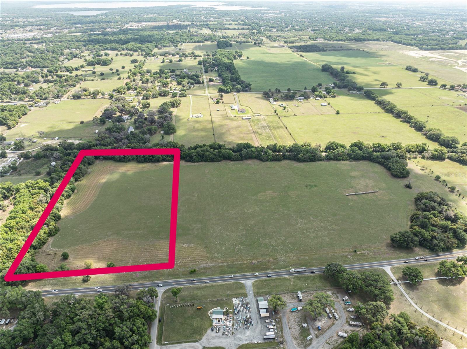 Prime 10-Acre Investment Opportunity with Commercial Potential! Ideally located on S US Highway 301 in the heart of Summerfield, this 10-acre parcel is currently zoned A-1 (General Agriculture) but is surrounded by established commercial development, making it an excellent candidate for those seeking future commercial possibilities. Buyers interested in commercial use should verify rezoning requirements and approvals with Marion County. Boasting exceptional frontage and visibility along US Highway 301, this property offers outstanding exposure in one of Central Florida's rapidly growing corridors. Whether you're an investor, developer, or business owner looking to capitalize on the area's continued growth, this property presents a unique opportunity with tremendous upside. Conveniently located just minutes from The Villages, shopping, dining, medical facilities, and Interstate 75, the location combines accessibility with strong development potential. With commercial properties surrounding the site and continued growth throughout the area, this is a rare chance to acquire a large parcel in a highly desirable location. Bring your vision and explore the possibilities of this exceptional property.