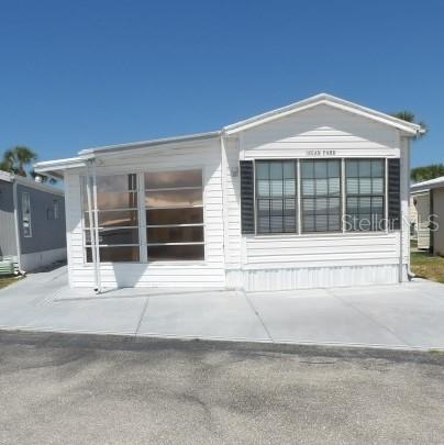 How about moving to Englewood and buying a Manufactured Home for only $73,000 that comes with a Club Car Golf cart!!
This community has so much to offer besides being only 15 minutes to the beaches.
Some of The Amenities here are a heated pool, Bocce ball, shuffleboard, horseshoes and a Clubhouse with many fun Activities.  There is a Community Boat ramp and for an additional fee you can store your Boat/RV in this fenced on premises Storage yard.
You own your land so no monthly rent fees.

The Monthly HOA is $140. and includes your water and sewer, common ground maintenance, trash pick, manager on site and a laundry facility for your convenience.  Deed Restrictions.

Home is perfect for your winter retreat or use as a rental and has many amenities close by.
Public Boat ramps and public golf courses.  Shopping and Doctors and entertainment on Historic Dearborn St in The Art District.
Gulf front dining and more.
This adorable 1 bedroom 1 Bath home has a Florida room that measures 20' x 10 feet and has Air in it.  That is included in the total Under roof sq feet. Very cozy inside and comes furnished. Buyer/Buyer's Agent should verify all information mentioned that is to the best of our knowledge.

Sold-As-Is, Subject to buyer's approval