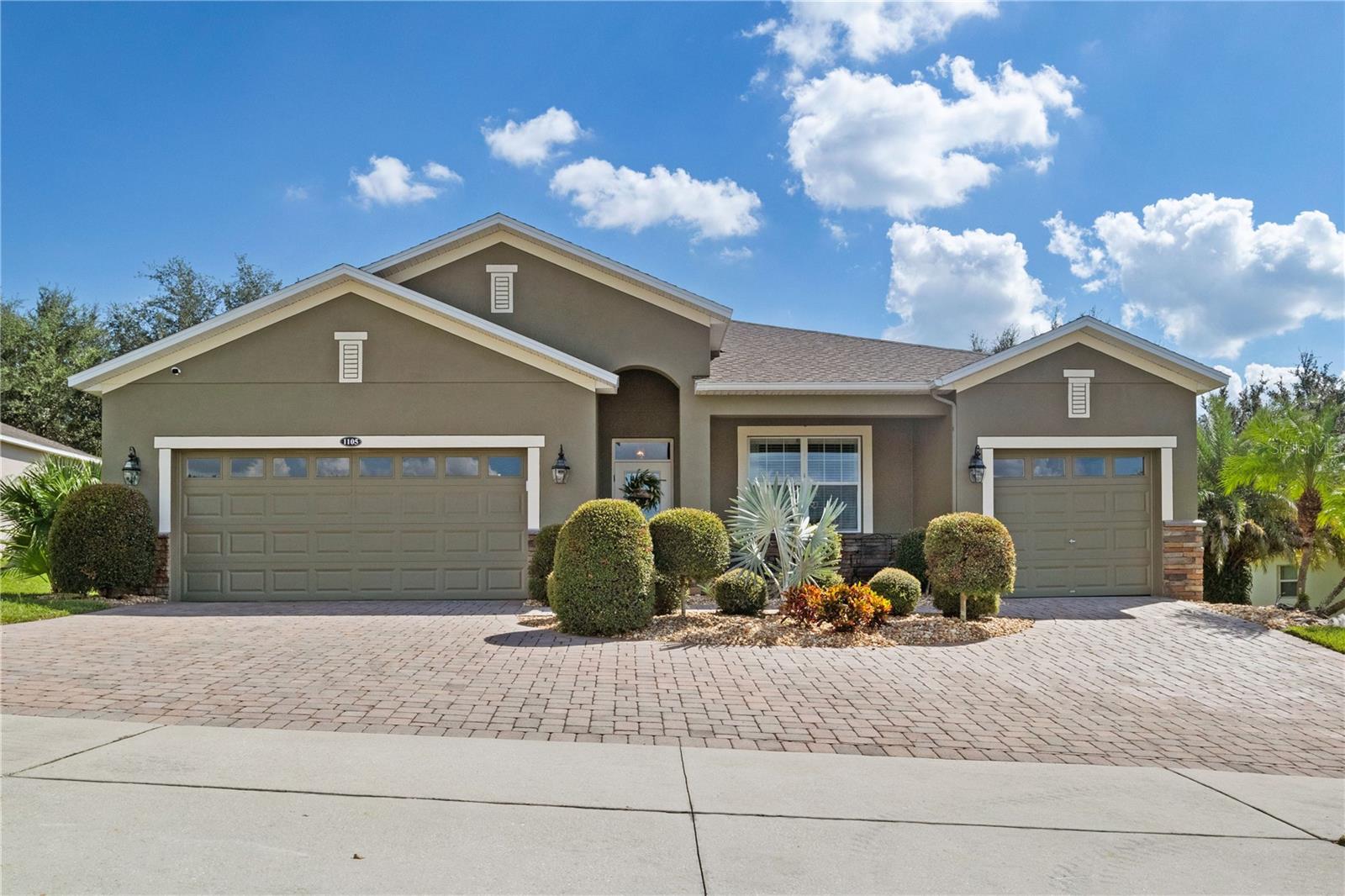 New Roof installed March 2023 ...Stunning and Immaculate 4 bedroom / 3 bath POOL Home with a 3 CAR GARAGE, with AC only 3 yrs. old and newly PAINTED EXTERIOR (2022). This knock-out of a home is located in Legends GOLF Country Club, a premier residence, perfectly located in the heart of Clermont, and is sure to please! Gorgeous hardwood floors welcome you as you first enter the home. Spacious kitchen is fully loaded with an array of cabinetry, counter space, oversized stainless sink, New LG Refrigerator, New Samsung Washer/Dryer, designer backsplash, granite countertops, and a solar sky light for added ambience. Master suite sits pretty with sliding glass doors that provide private access to the enclosed back deck and sparkling pool, with a newly installed handrail and recently replaced screens.  Master bath is designed with dual sinks, a large garden tub and updated tiled walk-in shower, with corner bench. Revel in the Florida Lifestyle with family and friends, in your very own sparkling pool, with a POOL HEATER < 2 yrs. old! As if a 3 Car Garage was not enough, two 4x8 ceiling racks have been added. All this and more….Legends Country Club Community also has Lavish Amenities that Include: Gated Entrance with Guard on duty 24/7, Fitness Center, Pool/Spa, Sauna, Tennis, Playground, basketball courts & Newly renovated 10,000+ sq. ft. Club House! *****(HOA dues INCLUDE all the amenities + Home Internet and TV cable). Home is located in close proximity to Hwy 27, Hwy 50, Florida Turnpike, Schools, Hospital and Shops. Approximately 25 Minutes from Disney – The Entertainment Capital of the World. 
The home has been lovingly cared for and the owner has been relocated for a job transfer.....Call today for a personal tour of this incredible home!