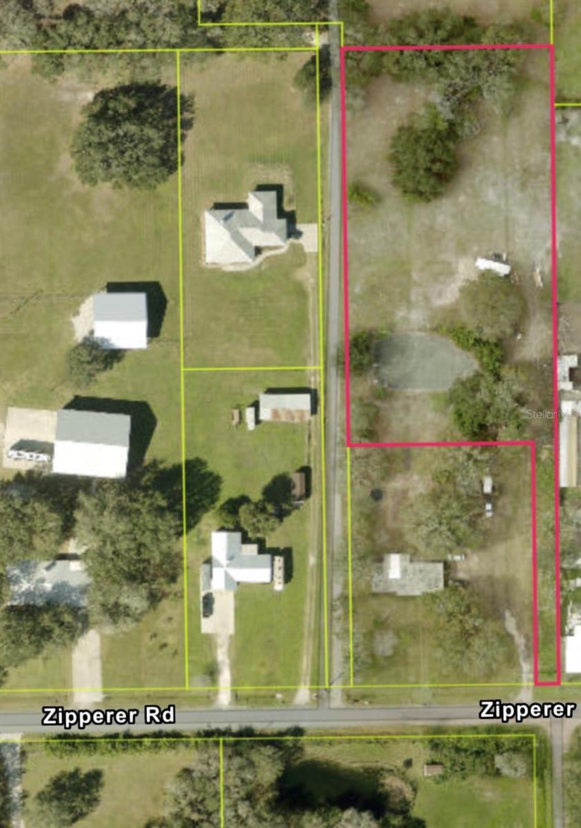Location, location, location! Experience peaceful country living on the edge of Lakewood Ranch, just beyond the historic oak canopy that lines Zipperer Road. Enjoy breathtaking sunset views through mature oak trees and quiet nights under the stars.
This 2-acre property is mostly cleared, featuring beautiful oak trees and open pasture land. Highlights include a private tennis/pickleball court and a high-and-dry homesite—no flood insurance required.
Utilities are conveniently nearby, with city water available at the road (or option for a private well), electric access, and septic needed. The property is a flag lot with a private deeded easement, offering added privacy and seclusion.
Ideally located 20 minutes from downtown Sarasota and just minutes to UTC Mall and Ellenton Premium Outlets—perfectly positioned between premier shopping, dining, and entertainment to the north and south.
A rare opportunity to own acreage and build your dream home in this rapidly growing prime location— don’t miss your chance!