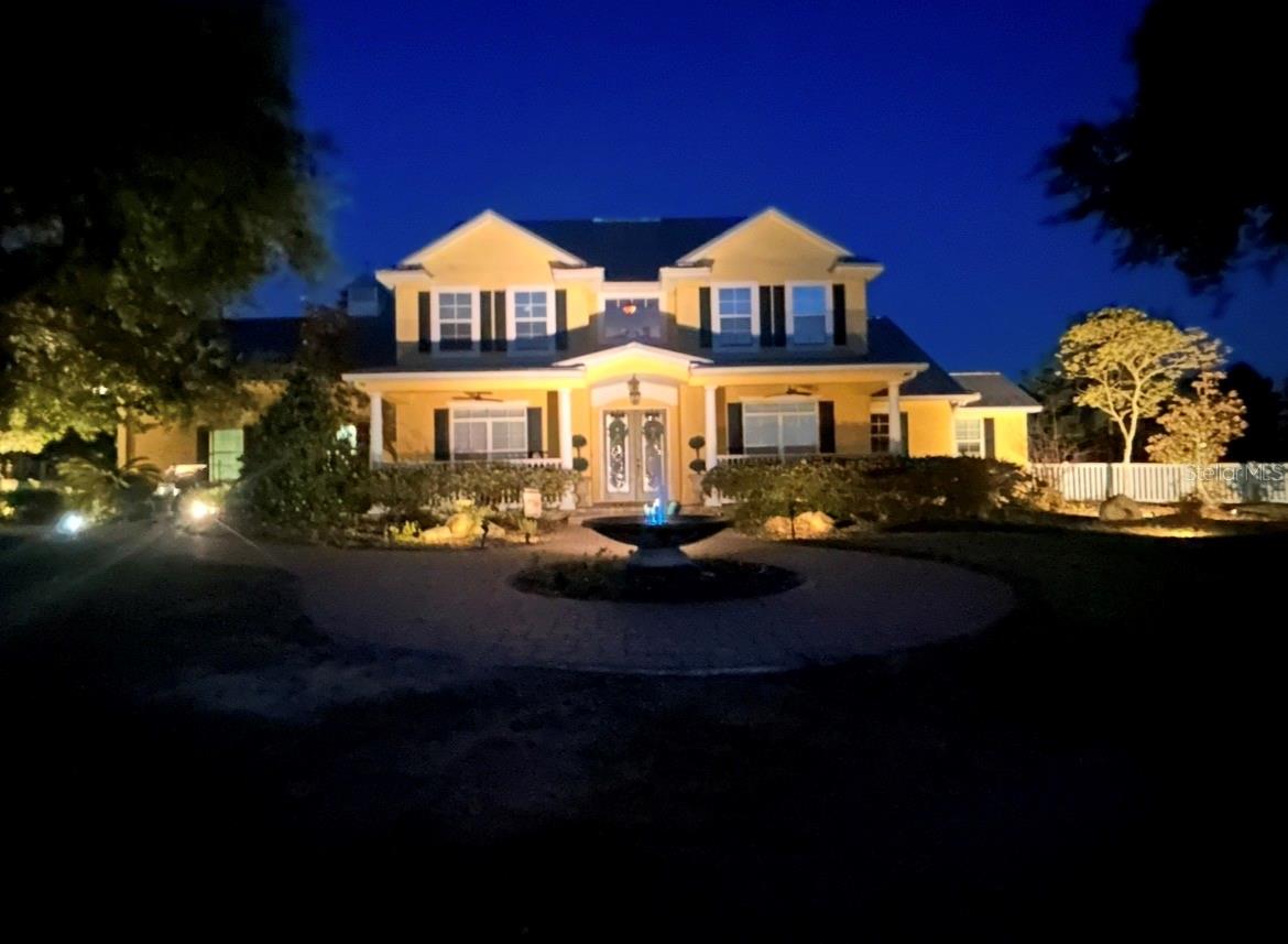 Breathtaking qated custom built ranch located in Lake of the Hills of Lake Wales. 17 acres of sprawling lush pastures sitting atop one of the highest points in Central Florida.  This gorgeous tree-lined property fully landscaped, ranch is definitely one of a kind.  17 acres fully fenced beautiful horse property. You will be mesmerized by the unobstructed panoramic views for miles upon miles.  Breathtaking sunsets & sunrises.  Graced by the sounds of the beautiful bells from Bok Tower and so much more. The main residence features 4 bedrooms  4 bath, open floor plan, eat-in kitchen, great room, office, sitting room or formal dining and craft room. Detail on the light throughout the home was imperative. Large covered pavered front porch overlooking the tranquility of Lake Starr.  While the back of the house opens onto an oversized roofed and screened pool and outside living area overlooking lush tree-lined pastures.  Large Master en-suite located on the main floor features french doors opening onto the outside pool area. His and hers walk in closets... hers will not disappoint in size ( 16 x 12 ) with custom built in shelving throughout.  Guest bedrooms & craft room located upstairs in the open balcony setting with panoramic views of the entire estate.  Meandering down the beautiful fence lined pathway to gorgeous stables and inviting 2 story guesthouse.  Greeted by sprawling large paver patio, portico, with 2 firepits, built-in sitting area and lighting throughout. Beautiful paver breezeway entering into 6 oversized concrete stalls w/ padded flooring, automatic water feeders, fans and lighting throughout. Attached 2 story guesthouse rustic features greet you into the open kitchen, master suite and bath w. large sauna on the main floor.  Upstairs into a huge great room, large panel seamless glass overlooking the stalls below and views from afar.  The great room also features a custom bar, beautiful rustic tin roof then step onto a balcony for the breathtaking panoramic view of the entire ranch along with miles upon miles of the entire area as far as your eyes can see.  This is absolutely a one of a kind paradise.  APPOINTMENTS ONLY