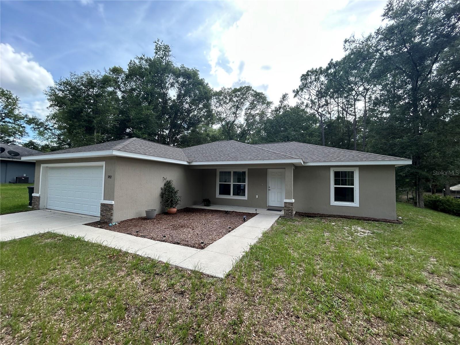 Discover your ideal home in this beautifully designed three-bedroom, two-bath residence situated on just under
an acre in peaceful and charming Rainbow Acres. This property features an open floor plan that seamlessly
connects the spacious living area, perfect for both relaxation and entertaining.
