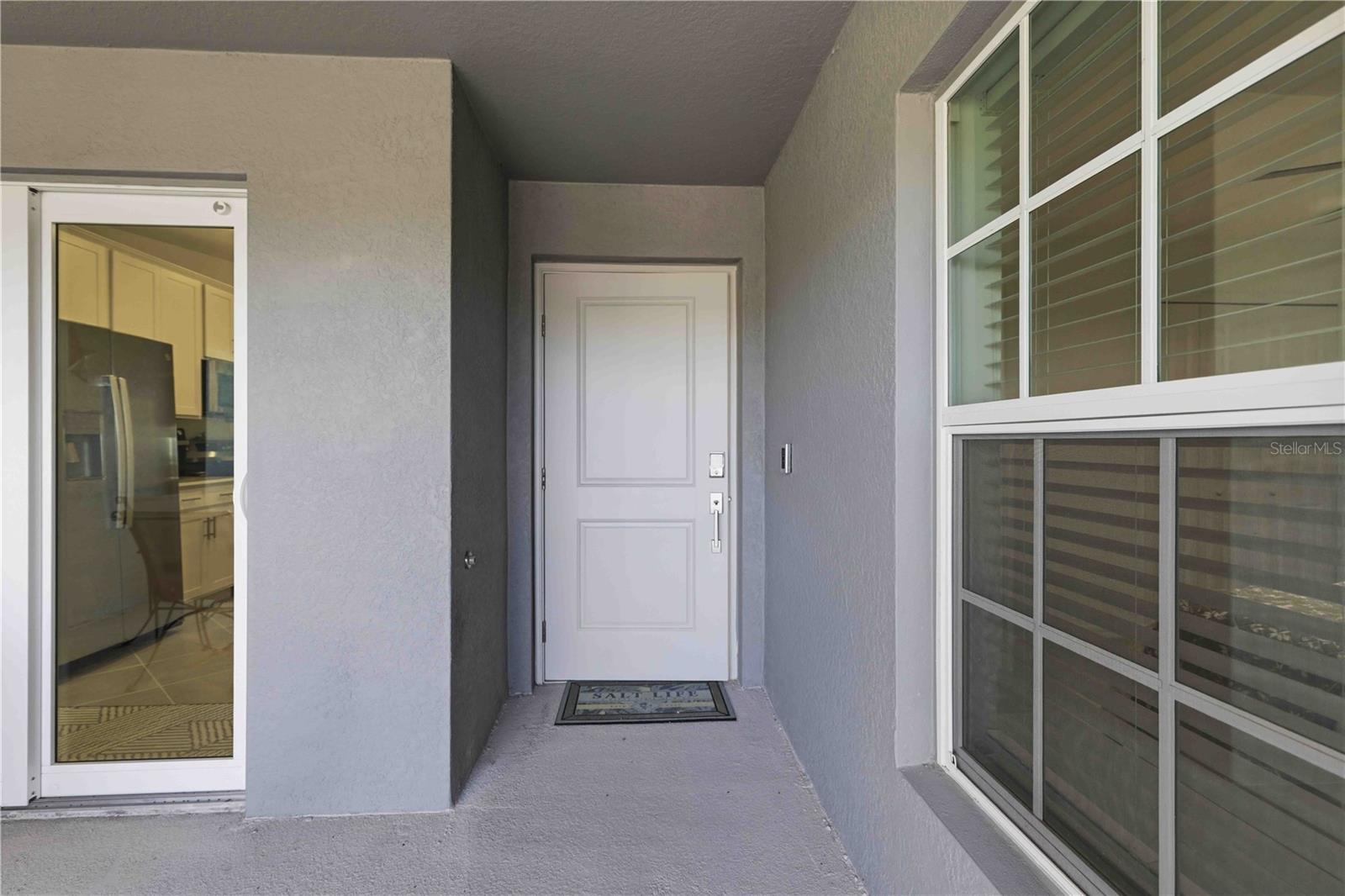 Golf Membership INCLUDED + STUNNING WATER & GOLF COURSE VIEWS! Some FURNITURE INCLUDED. This beautifully positioned second-floor Veranda condo in Wellen Park Golf & Country Club offers the perfect blend of luxury, lifestyle, and long-term value in one of Southwest Florida’s fastest-growing resort-style communities. Featuring 2 bedrooms + a versatile den, 2 bathrooms, soaring vaulted ceilings, and TWO screened lanais, this residence captures the essence of relaxed Florida living while creating exceptional appeal for both full-time residents and seasonal owners.

One of the most valuable features of this property is the inclusion of a DEEDED GOLF MEMBERSHIP — a highly sought-after benefit the builder has officially discontinued in future phases. Opportunities like this are becoming increasingly rare within the community, enhancing both desirability and future value potential.

Inside, the bright open-concept layout is designed for comfort and entertaining. The kitchen showcases quartz countertops, stainless steel appliances, abundant cabinetry, and a large center island flowing seamlessly into the dining and living spaces. Expansive rear views overlook peaceful water and lush fairways, creating a serene backdrop throughout the main living areas. The front screened lanai adds additional outdoor living space perfect for enjoying morning coffee or evening sunsets.

The spacious primary suite features custom-built closet systems, dual vanities, and a beautifully tiled walk-in shower. Guests enjoy privacy with the split-bedroom floor plan, while the den with French doors easily functions as a home office, media room, or additional sleeping area. Hurricane impact windows and doors provide peace of mind, and the private detached one-car garage offers additional convenience and storage.

This residence is ideally located near one of the community’s satellite pools, allowing quick access to additional relaxation and recreation areas. Wellen Park Golf & Country Club offers an exceptional resort lifestyle centered around an 18-hole Gordon Lewis championship golf course, along with a resort pool and spa, tiki bar, fitness center, tennis, pickleball, bocce courts, aqua driving range, dog park, full-service spa, firepit lounge, and vibrant social atmosphere. The upcoming clubhouse with upscale dining and social events will further elevate the community experience.

Conveniently located near Downtown Wellen Park, CoolToday Park, Venice Island, Gulf beaches, shopping, dining, and I-75, this property presents a rare opportunity to own one of the community’s highly desirable golf-included Veranda residences with exceptional lifestyle appeal and strong long-term upside.

Furniture negotiable.