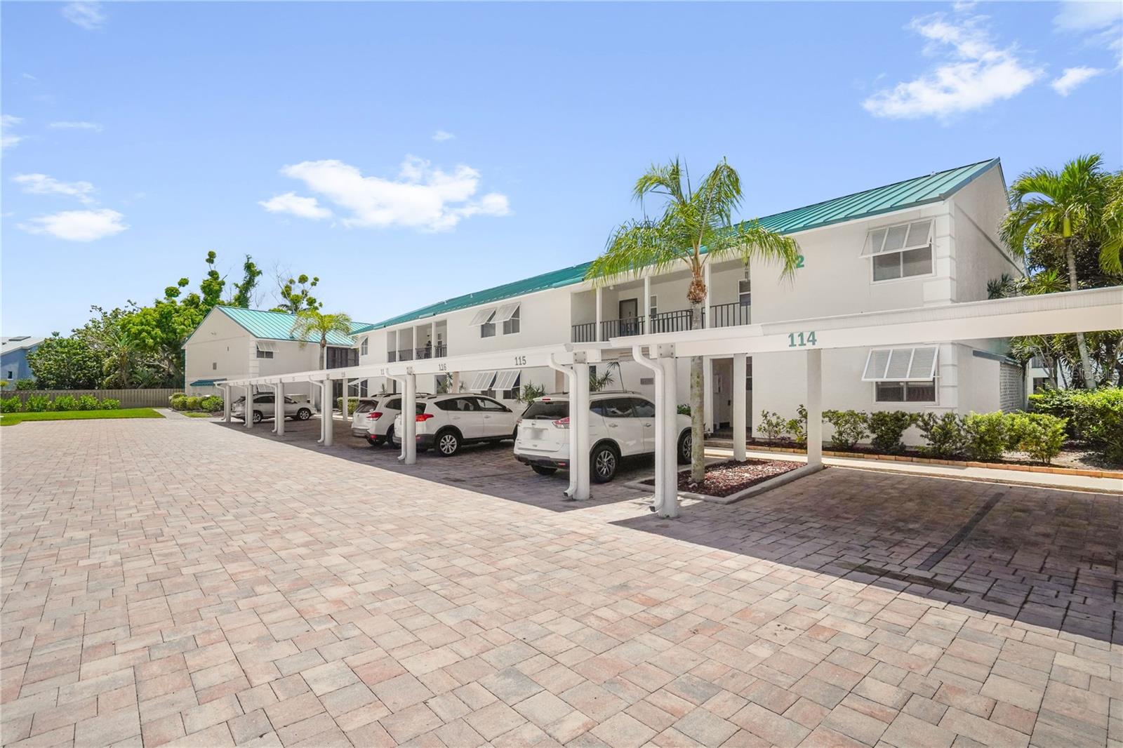 Seller is offering a $5,000 flex credit — apply it toward a mortgage rate buydown to lower your monthly payments, or use it as an appliance package credit. Your choice, your move.

Welcome to Unit 201 at White Sands Condominium — a bright, airy coastal retreat perfectly positioned on iconic Midnight Pass Road, Siesta Key. This spacious 1,012 sq ft, two-bedroom, two-bathroom condo is your gateway to the laid-back island lifestyle you've been dreaming of. Whether you choose to walk, cycle, or simply stroll, the world-famous Siesta Key Beach — voted the #1 beach in the USA — is just moments from your front door.

Step inside and feel immediately at home. Generous natural light floods the open living spaces, beautifully complemented by wood-look flooring that runs throughout the unit, giving it a polished feel with all the ease of coastal living. The thoughtful layout offers two full bathrooms plus a convenient in-unit washer and dryer, so laundry day never interrupts island day. A dedicated storage closet rounds things out, giving you that extra breathing room that makes everyday life so much easier.

When the sun starts to dip and the breeze picks up, step out onto your private covered lanai — the ideal spot to mix a cocktail, host friends, or simply let the Siesta Key evening wash over you. Sheltered and spacious, it extends your living space outdoors in true Florida fashion, and is the kind of feature you'll use every single day.

Beyond your front door, White Sands offers a wonderful sense of community. Take a dip in the sparkling community pool, or take advantage of the community boat docks — available on a first-come, first-served basis — perfect for those who love life on the water. And with your own deeded covered parking spot, convenience is always part of the package.

This is more than a condo — it's a front-row seat to everything that makes Siesta Key one of Florida's most sought-after addresses. Whether you're looking for a full-time residence, a vacation escape, or a smart investment, Unit 201 checks every box.
