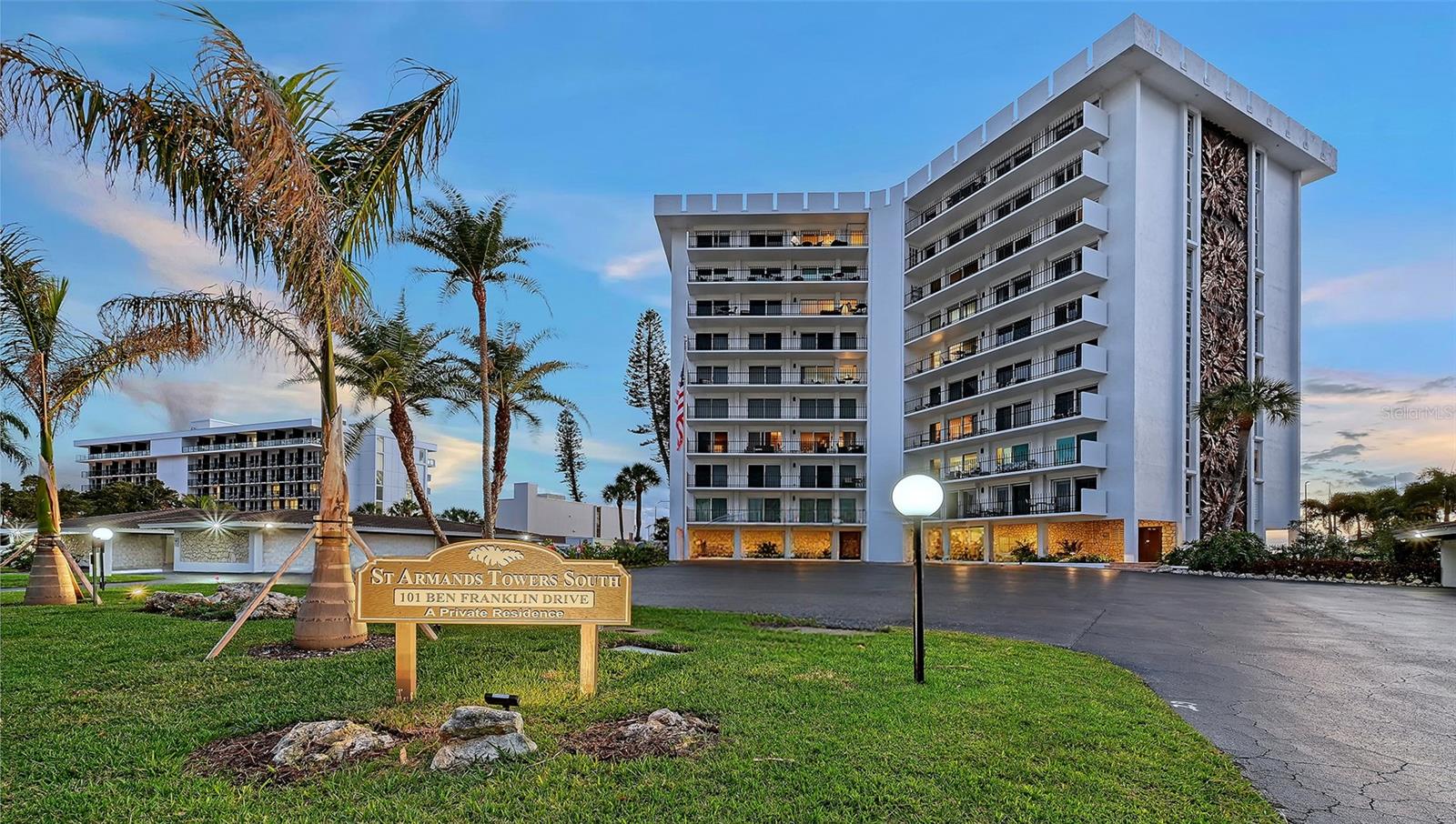 Once-in-a-generation opportunity in St. Armands Towers South: Discover unparalleled Gulf-front living with unrivaled scale in this fully reimagined four-bedroom, four-bathroom, 8th-floor residence. A masterful combination of units #85 and #86, this rare condominium residence features flowthrough sunrise-to-sunset views and creates one of the building’s few true four-bedroom offerings. The expansive, custom footprint spans roughly 2,550+ square feet of prime beachfront real estate. Boasting sweeping, panoramic vistas of the Gulf, Lido Beach, Pansy’s Bayou, and the iconic Sarasota skyline, this sprawling retreat eliminates the space constraints of traditional high-rise living. It offers a single-family home's footprint paired with effortless condominium convenience, perfect for enjoying endless sunrise-filled mornings and stunning sunset evenings. Step inside to find a comprehensive remodel characterized by high-end finishes and an open-concept design that prioritizes the stunning vistas. The beautifully composed living spaces contribute to a refined yet inviting atmosphere, flowing seamlessly to two expansive 45-foot balconies ideal for salt-kissed breezes, sunset soirées, and indoor-outdoor entertaining. The well-appointed chef's kitchen was crafted for high-end living, boasting leathered quartzite countertops, premium custom cabinetry with seamlessly integrated Sub-Zero and Miele appliances, a Samsung range, and elegant recessed and under-cabinet lighting. Directly adjacent, the full-service bar serves as an entertainer's dream, featuring quartzite counters, an integrated Monogram wine sommelier, and a discrete two-drawer Fisher & Paykel dishwasher. This area opens directly to a spacious dining room and lounge area—a grand, cohesive entertaining space that comfortably hosts a full dining table and a separate standalone table, with four club chairs in a conversational arrangement, perfectly transitioning the living room to the dining spaces. Designed to balance leisure with productivity, the updated floor plan also includes a quiet, dedicated private office. The residence features four bedroom sanctuaries, each with direct balcony access through sliding glass. Dual primary suites ensure a private experience with dedicated ensuite baths, while the remaining two bedrooms enjoy convenient access to full bathrooms just across the hall. For ultimate convenience, the property includes two assigned covered parking spaces and two private storage lockers perfect for beach gear. Enjoy complete peace of mind in a building that features resort-caliber amenities, including a newly modernized lobby, a heated pool, a fitness center, on-site management, and a welcoming, pet-friendly policy. Embrace island life from this iconic location situated directly across the street from the powdery white sands of Lido Beach. Enjoy a two-block stroll to upscale boutiques, sidewalk cafes, galleries, and award-winning dining on St. Armands Circle. Located just 3 miles from the mainland, the theaters, opera, and museums of Florida’s "Cultural Coast" are right at your fingertips.