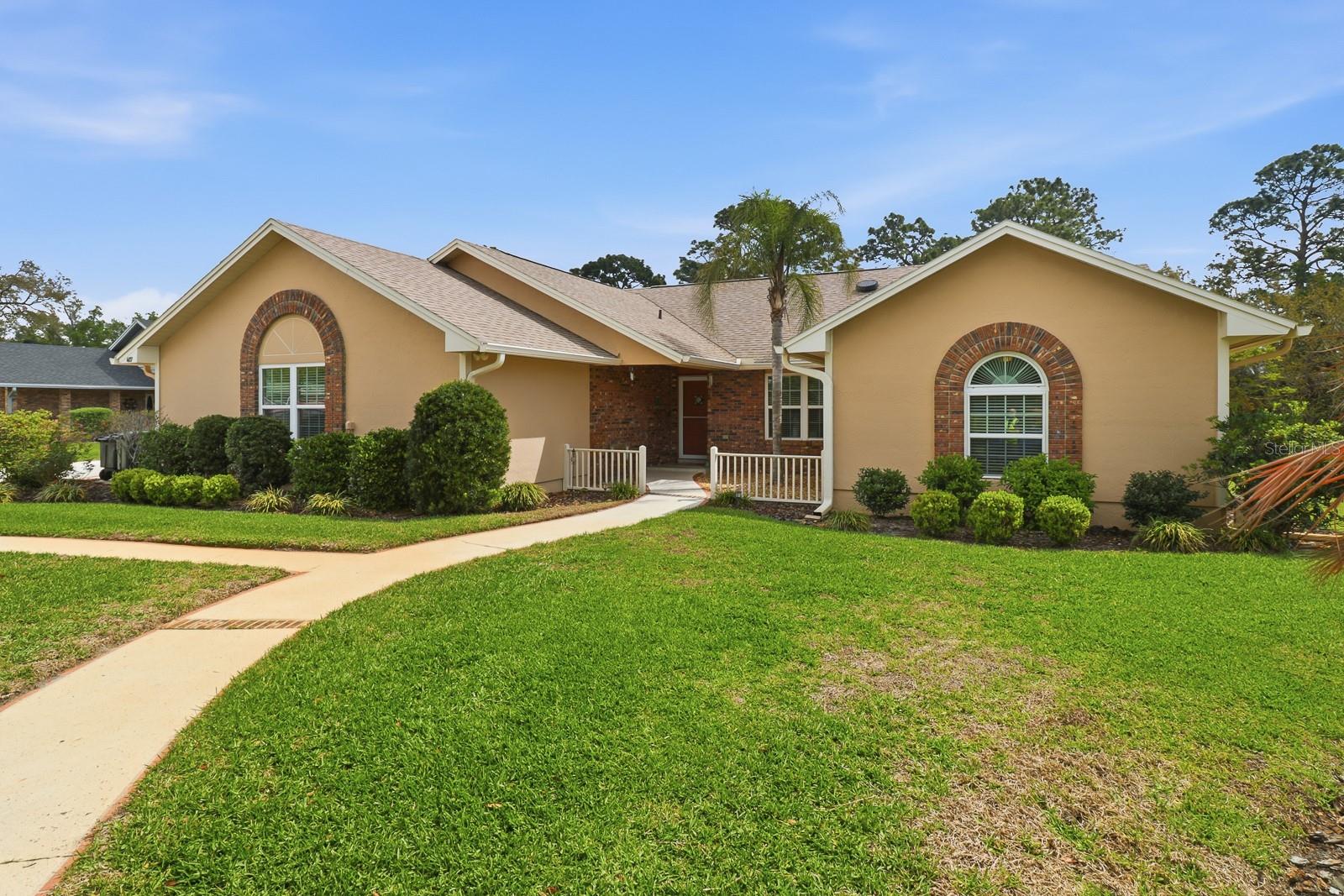 Seller Motivated!!!! Welcome to your private retreat in the highly sought-after GLEN ABBEY community—where timeless charm meets modern comfort, and with NO HOA the possibilities are endless! Nestled on just over a half an acre and perfectly positioned along the 4th Fairway of Glen Abbey Golf Course, this spacious 3-bedroom (with an additional easily converted dining room to office space), 2-bathroom home offers over 2,500 square feet of thoughtfully designed living space. From the moment you step inside, you’re greeted by a warm, traditional aesthetic that feels both inviting and refined. At the heart of the home, the expansive great room is a true showstopper! This incredible room boasts a wall of windows that flood the space with natural light, while showcasing serene golf course views. This open and airy setting is perfect for both relaxing evenings and entertaining guests. Step through into your spacious living room and cozy up in front of your wood burning, brick fireplace to enjoy on cool, Florida, winter evenings. The kitchen and bathrooms have been tastefully updated with granite and quartz countertops, cabinetry, and fixtures complemented by updated flooring throughout the home for a cohesive and modern feel. Comfort and efficiency are top of mind with two air conditioning units, a newer roof (2020), new windows (2020), and a hot water heater just 2 years old. The spacious primary suite is your personal sanctuary, complete with sliding glass doors that lead directly to the outdoor patio and pool area—just step outside to enjoy your own backyard oasis offering tranquil views of the golf course and seamless indoor-outdoor living. The large patio surrounds a solar-heated, screened-in inground pool with a beautiful paver deck, —perfect for year-round enjoyment, entertaining, or simply unwinding- with an outdoor shower so you can wash off your sandy toes! Along with attractive, mature landscaping, this home boasts a well for irrigation to keep utility bills low (pump recently replaced) and a large, outdoor storage shed with connected power and a garage-kept whole house water softener and filtration system. With its generous lot size, prime golf course frontage, NO HOA and blend of classic style with modern updates, this Glen Abbey gem offers a rare opportunity to enjoy space, comfort, and freedom—all in one exceptional home. Schedule your showing today!