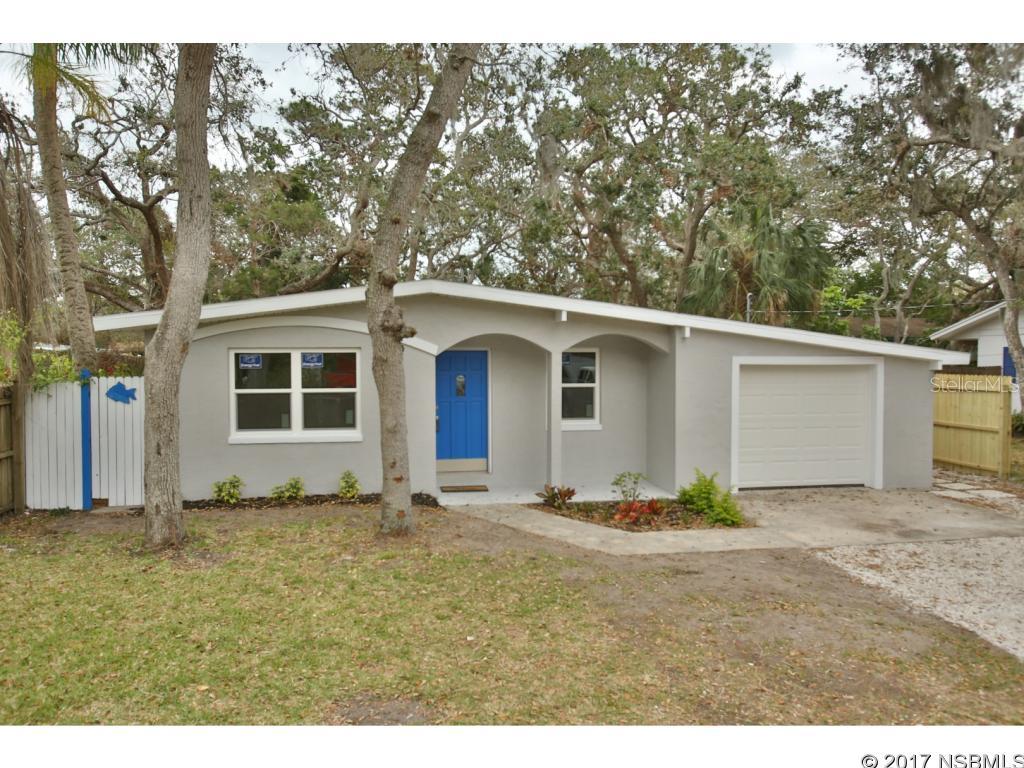 Beautifully renovated like new turnkey beachside home with sparkling finished terrazzo floors.  3 Bedroom 2 bath with den, spacious new renovated open kitchen design with stainless steel appliances, glass tile backsplash with LED lighting, enclosed garage.  Located within walking distance to Flagler Avenue , Third Avenue shops and restaurants, and the boat ramp....put your boat in and drive the trailer back to your front yard ( No HOA"s). Renovations include A/C, bathrooms, master bedroom with adjoining bathroom, electrical, new plastic plumbing lines from street and LED lighting.  A great family home with glass french doors opening to a rear pavered patio and large private fenced landscaped outdoor retreat. ;Water: City