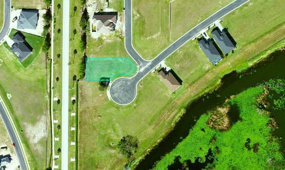 Build your dream home in one of Central Florida’s most elite gated communities. This oversized corner lot on a quiet cul-de-sac, spanning over 1/3 acre, is located in the highly sought-after Water Ridge community—an exclusive, tree-lined ridge surrounded by three pristine lakes, where every homesite enjoys water views. 
Perfectly positioned to capture stunning sunrise views, this homesite offers ample space for your custom estate, private pool, and outdoor living areas designed to take full advantage of the serene setting.
Water Ridge delivers a true resort-style lifestyle, featuring three community pools, a state-of-the-art fitness center, elegant clubhouse and community center, boat dock, pickleball, tennis, and basketball courts, and beautifully maintained lush landscaping throughout the neighborhood.
Enjoy privacy, luxury, and breathtaking natural beauty—all just minutes from shopping, dining, and major corridors. This is a rare opportunity to create a custom masterpiece in one of the area’s most desirable lakefront communities.