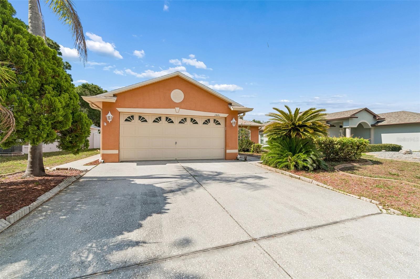 One or more photo(s) has been virtually staged. Welcome to 1441 Watermill Circle, a spacious and well-maintained home nestled in the desirable Watermill community of Tarpon Springs. Offering nearly 2,000 square feet of living space, this inviting residence features a bright and functional floor plan designed for comfortable everyday living and effortless entertaining.
From the moment you step inside, you'll appreciate the generous living areas filled with natural light and a seamless flow between the living room, dining area, and kitchen. The thoughtfully designed layout provides plenty of space for gathering with family and friends while maintaining a warm and welcoming atmosphere throughout the home.
The primary suite serves as a private retreat, offering ample space, comfort, and privacy. Additional bedrooms provide flexibility for family, guests, a home office, or hobby space. With multiple living areas and a versatile floor plan, this home offers endless possibilities to fit your lifestyle.
Major improvements include a newer roof installed in 2020, providing peace of mind for years to come. Outside, the property features a spacious yard with plenty of room to relax, garden, entertain, or create your own outdoor oasis.
Ideally located in the heart of Tarpon Springs, residents enjoy easy access to top-rated schools, shopping, dining, parks, golf courses, marinas, and the area's famous Sponge Docks. Outdoor enthusiasts will appreciate the proximity to Fred Howard Park, Sunset Beach, the Pinellas Trail, and beautiful Gulf Coast waters. Whether you're searching for a primary residence, seasonal retreat, or investment opportunity, this home offers exceptional value and an incredible opportunity to enjoy the Florida lifestyle in one of Pinellas County's most sought-after coastal communities.