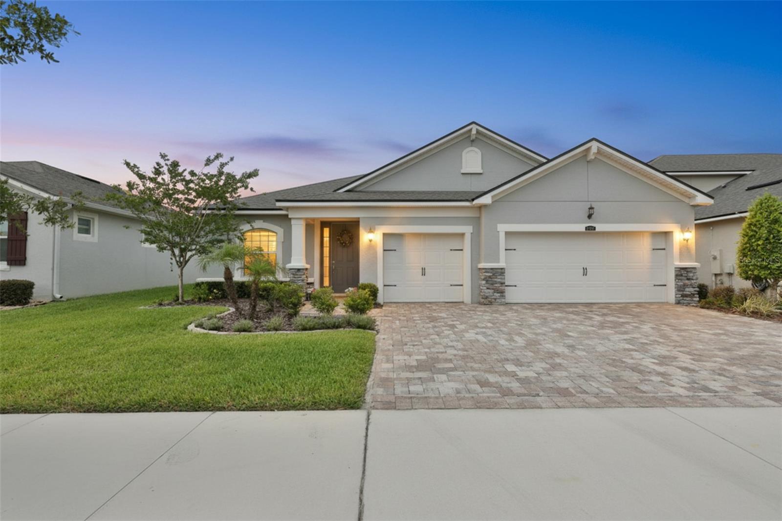 Welcome to Boyette Park, a gated community in the heart of Riverview where you'll enjoy peaceful pond views, resort-style amenities, and a home that's truly move-in ready. This 3-bedroom PLUS OFFICE, 2-bath home also features a 3-car garage and a screened patio overlooking a pond view. Inside, you're greeted by high ceilings and an open floor plan. The kitchen is the centerpiece of the living space, featuring upgraded quartz countertops, an oversized island, abundant cabinet storage, pantry, and charming brick accents that add warmth and character. It opens seamlessly to the dining and living areas, making it easy to stay connected whether you're entertaining friends or enjoying a quiet night at home. Off the entryway is where you'll find the dedicated home office space that could be a formal dining room or additional living room as well. The primary suite is located in the rear of the home and overlooks the backyard and pond and offers two large walk-in closets. The en-suite bathroom features dual sinks, a walk-in shower, water closet, and a linen closet. The two guest bedrooms share a guest bathroom. You'll find the rooms to be large and the closets roomy for the floorplan. Off the entry of the 3-car garage is a mudroom/catch-all space that leads into the interior laundry room. One of the best features of this home is the outdoor living space. Open the sliding glass doors and step onto the screened patio, where you can relax with your morning coffee, unwind after work, or simply enjoy the peaceful water view. The backyard feels open and private and is fully fenced. Additional features include a water softener, interior laundry room, a sprinkler system that runs off of reclaimed water, and hurricane shutters. Boyette Park residents enjoy access to a resort-style community pool, grilling area, playground, and gated entrance, all conveniently located near shopping, dining, and major commuter routes. If you've been searching for a home with a great layout, beautiful water views, and a community you'll love coming home to, this one is worth a look.