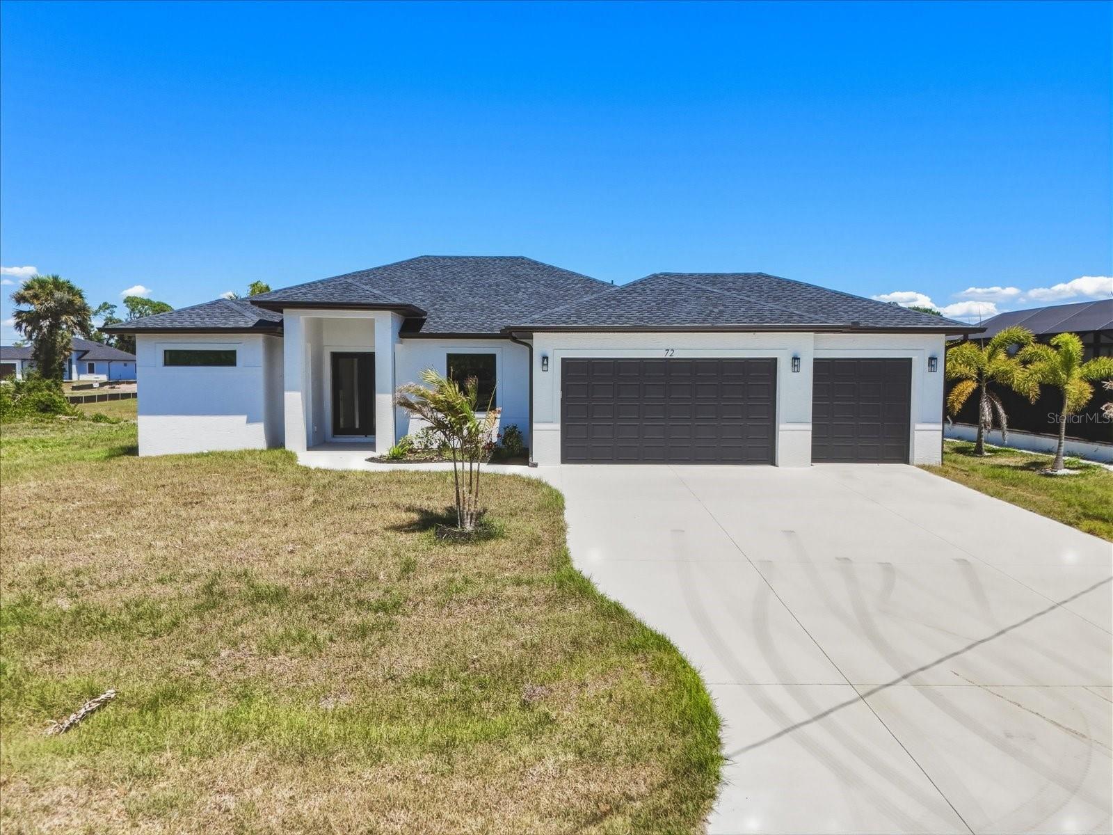 MOVE-IN READY | BRAND-NEW CONSTRUCTION | POOL HOME | IMPACT GLASS | 3-CAR GARAGE | LOW HOA. 

From the moment you arrive, this exceptional home makes a statement—featuring a coach-lit driveway, inviting front porch, and elegant double-door entry that set the tone for the quality craftsmanship found throughout.

Located in the highly desirable Rotonda West golf-course community—just 15 minutes to Englewood Beach, this 4-BEDROOM, 3-BATHROOM, 3-CAR GARAGE residence was thoughtfully designed with no detail overlooked and no feature understated.

Step inside to soaring volume ceilings, 8-foot doors, and a light-filled, open-concept layout. The Living Room showcases a dramatic tray ceiling with recessed lighting, and a 6-foot ceiling fan, while a 3-panel POCKETING sliding glass door opens seamlessly to the covered lanai—creating the ultimate indoor-outdoor Florida lifestyle. The Dining Area is ideal for entertaining, enhanced by dual sliding glass doors and ample space for a statement sideboard.

At the heart of the home, the chef-inspired Kitchen impresses with a massive 9-FOOT ISLAND, TWO oversized 5-FOOT PANTRIES, high-end stainless steel appliances, quartz backsplash, and European styled cabinetry topped with striking veined quartz countertops. 

The split-bedroom floorplan offers privacy and flexibility. The luxurious Primary Suite features lanai access, tray ceiling, transom window, dual walk-in closets, and a spa-like en suite with an expansive tiled walk-in shower with dual showerheads, split quartz vanities, private water closet, and linen storage. A JUNIOR PRIMARY SUITE offers its own en suite bath, which also functions as a convenient pool bath—ideal for guests.

Throughout the home, enjoy easy-care, allergen-free porcelain plank flooring and a premium lighting package including ceiling fans, pendant lighting, and elegant chandeliers.

Step outside to your private oasis—featuring a 41’ screened pool deck with sunshelf, plus TWO lanais, including a 30-foot entertaining space and a second private lanai off the rear guest bedroom.

Built for durability and peace of mind, this home includes HURRICANE IMPACT WINDOWS & SLIDERS, a HIP ROOF design for potential insurance savings, off-ridge venting, and superior STEM WALL construction—engineered for Southwest Florida conditions. FEMA LOMR application is in process, with builder elevation positioning the home for **Flood Zone X designation**.

The oversized 29’ x 22’ (679 sq ft) 3-CAR GARAGE features two hurricane-rated doors plus a convenient side-yard access door.

Enjoy a low annual HOA of just $190 with deed restrictions that preserve neighborhood quality—ideal for full-time living, seasonal use, or Airbnb investment potential.

Rotonda West is a sought-after, master-planned community offering 5 golf courses, The Hills Restaurant, parks with pickleball courts, playgrounds, walking trails, sidewalks, and scenic canals for fishing—all just minutes from marinas, boat launches, and the pristine Gulf beaches of Englewood.

With 2,025 sq ft under air that lives even larger thanks to its open design and volume ceilings, this move-in-ready home delivers luxury, function, and location.

Priced to sell—schedule your private showing today.
