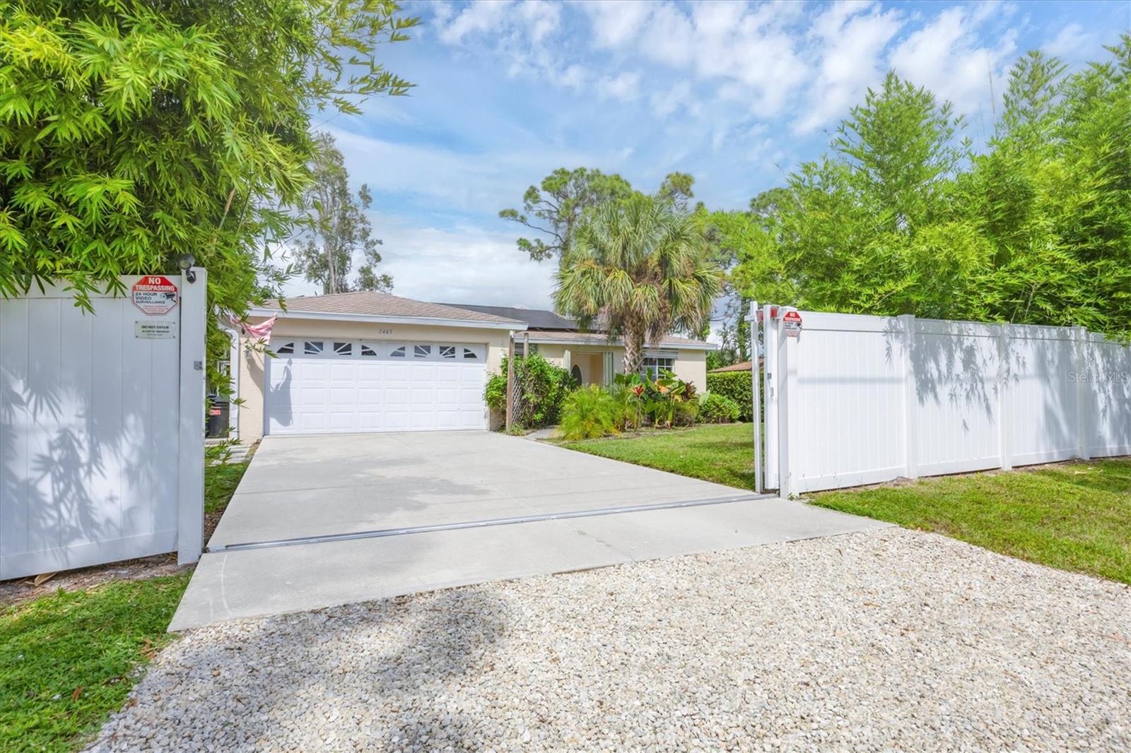 Location! Location! Location! NO FLOOD ZONE!SOLAR PANEL! NEW POOL CAGE!NEW FRONT FENCE PLUS SLIDING GATE! If you want total privacy, come check out this beautiful 3/2 Pool Home. This home has been almost fully updated, roof 12/2018 with transferable warranty, AC 6/2016, AC ducts 12/2018, bathrooms and flooring throughout the house 3/2017, water heater 2019, dishwasher 11/2020, full privacy fence 6/2020 and the house has been hooked up to public water 2019 and public sewer 2020. No need to worry about hurricanes. Hurricane Shutters have been installed 10/2020. You will find a tropical oasis in your totally private back yard. Pool with hot tub and large deck is surrounded by mature trees, including fruit trees, mango, Persian lime, bananas, papaya, avocado trees and pineapples. Walking distance to Riverview High School, shopping, 2 miles to the very famous and gorgeous Siesta Key Beach and just 10 minutes to beautiful downtown Sarasota. No deed restrictions.Conveniently located minutes away from I-75 and Tamiami Trail, this property offers excellent accessibility. Sarasota itself is a fantastic place to call home, with its central location providing easy access to shopping, dining, golfing, entertainment, medical facilities, award-winning beaches. Plus, you'll have effortless access to several airports, including Punta Gorda, Sarasota, Fort Myers, and Tampa.Experience the best of Florida with nearby beaches, golf courses, and outdoor recreational activities just a short drive away. Don't miss out on the chance to own this extraordinary home.