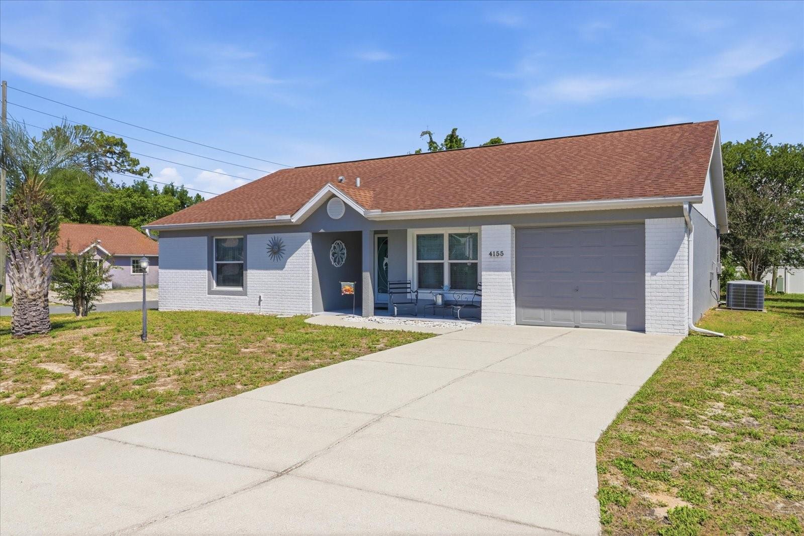 SWEET LITTLE HOME O’ MINE! Nestled on a quiet street in the friendly, easy-going community of Oakwood Village, a haven for your heart awaits! This lovely 1,459 sqft home sits on a .18-acre corner lot and is the perfect canvas for your personal story. Greeting you as you walk up is a charming white brick façade and a very inviting, covered front porch with plenty of room for rockers. Inside, the calming neutral colors and delightful simplicity throughout allow you to create a space that reflects your unique personality. The floorplan provides you with a seamless, functional flow, as well as a comfortably spacious living space with 2 bedrooms, 2 bathrooms, separate living and dining rooms, and a kitchen at the heart of the home. The kitchen boasts tile flooring, slate appliances including a gas range, raised breakfast bar and a pantry closet. A separate laundry closet off the kitchen is handy! The bedrooms are of ample size and closet space is generous. The plentiful number of windows throughout floods the home with an abundance of warm, natural light and just in case you can’t seem to get enough, try the large 15’x11’ enclosed sunroom for your fill. Or go all out and bask in the rays on your 12’x24’ patio in the privacy of your vinyl fenced backyard! Public water & sewer for convenience! NO HOA & NO DEED RESTRICTIONS! NO FLOOD ZONE! All this is located right in the HEART OF BEVERLY HILLS. An AMAZING LOCATION where literally, less than 5 minutes away, you will find the Community Park, the Boys & Girls Club, public library, Lake Beverly, shopping, medical offices, pharmacies & schools. Only 3.5 miles away from Citrus County’s BRAND-NEW RETAIL HUB, The Shoppes at Black Diamond. This hot spot is a Shopper’s Delight, featuring many well-known retailers, as well as some of your favorite Big Box Stores. A FREE 1-YR HOME WARRANTY for PEACE of MIND is OFFERED to the BUYER!