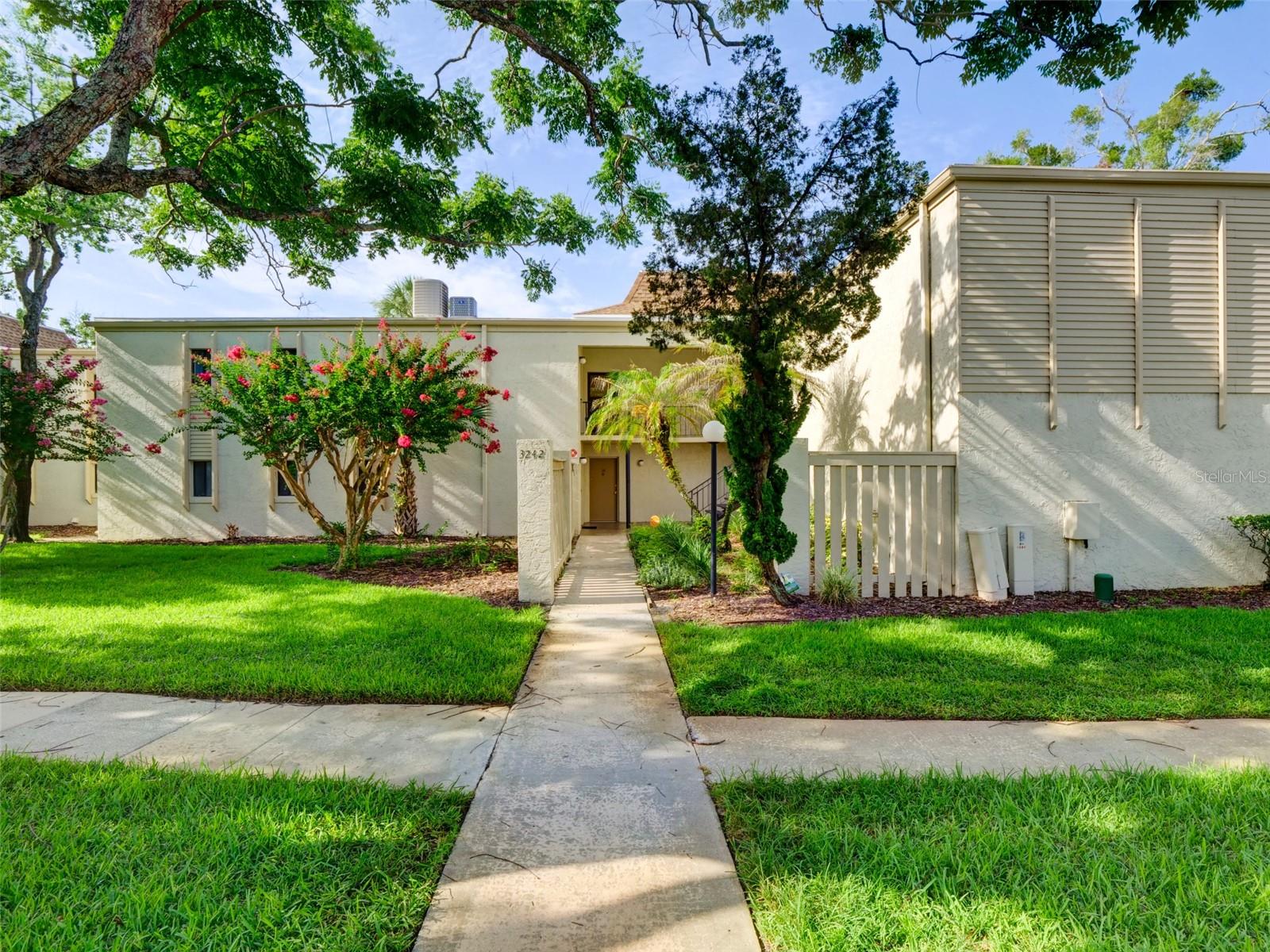 Welcome to this beautifully maintained 2 bedroom, 2 bathroom condominium located on the second floor in the sought after gated community of Wimbledon! This inviting home features a bright and open floor plan with spacious living and dining areas, creating the perfect space for both everyday living and entertaining.

The kitchen offers ample cabinet and counter space, while the generously sized bedrooms provide comfort and privacy. The primary suite features an en-suite bathroom, and the enclosed balcony offers a peaceful retreat where you can relax and enjoy serene views.

Enjoy the ease of low maintenance living with an impressive selection of community amenities, including a clubhouse with a fitness center, a sparkling swimming pool, tennis courts, and beautifully maintained grounds.

Ideally located just minutes from Orlando International Airport, SR 408, SR 528, major hospitals, shopping, dining, and entertainment, this home offers unbeatable convenience for commuters and residents alike.

Whether you're a first-time homebuyer, looking to downsize, or searching for a fantastic investment opportunity, this centrally located condo offers exceptional value in one of Orlando's most convenient locations.

Don't miss your opportunity to own this wonderful home, schedule your private showing today!