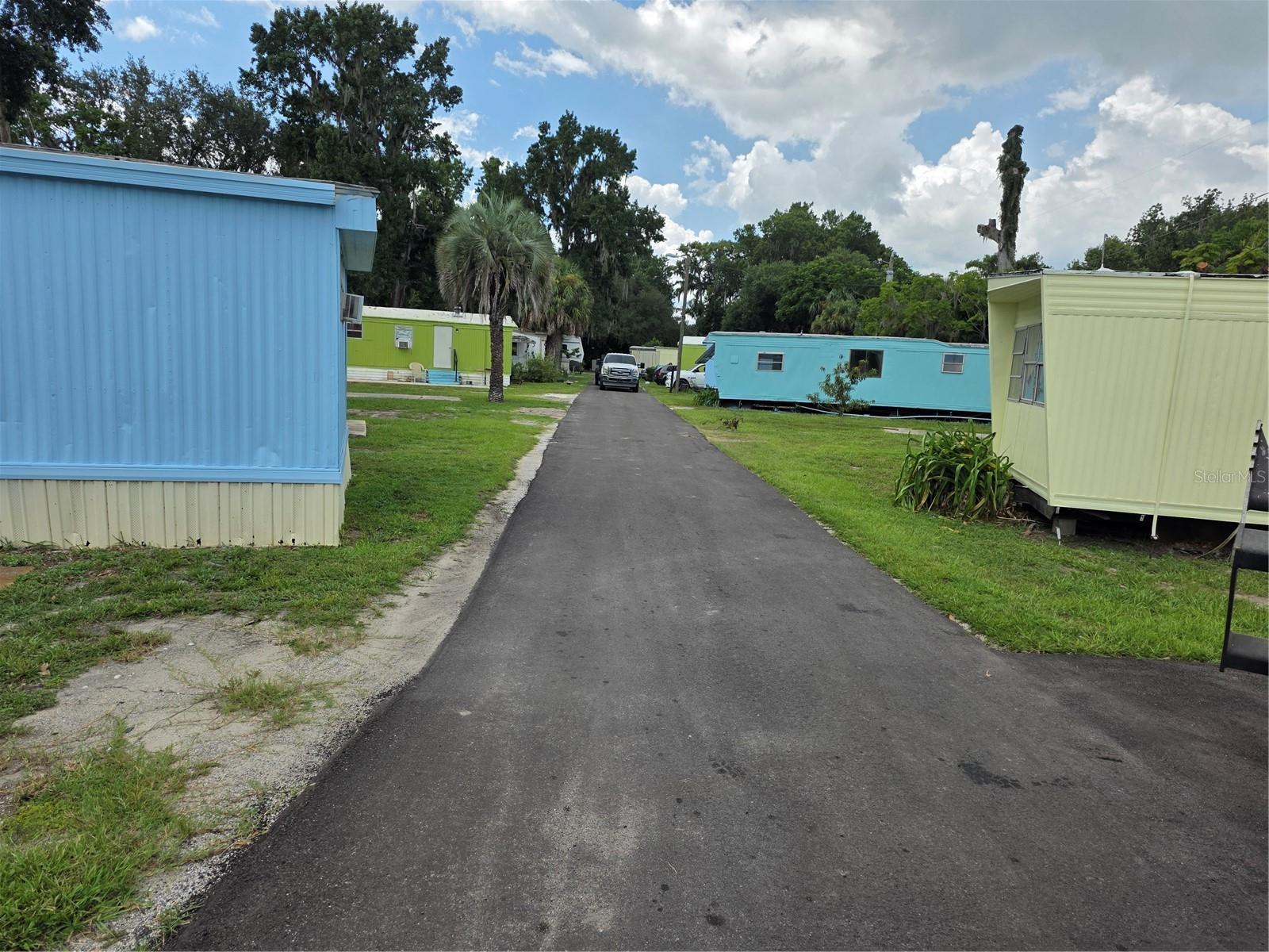This is a rare opportunity to own this park, it has not been for sale sense 1971. There is 22 sites. 
Currently 14 mobile homes on sites owned by the park, there is one block cottage and one block utility building for well equipment. 
The park is on a well, well services and equipment are new or newer. Park has chlorinator system so the water is clean and drinkable, no iron in the water. Water services are managed by water utility company.
Park fronts County Road 44, Dura Stress Concrete is a 1000 feet down the road, and is one of the larger employers in the area. This is what keeps the park full with tenants.
Rents in the area go for as high as $1,300. monthly, tenant pays their own electric and WIFI. 
The park is being renovated, current management is managing the repairs remodel. 
Price reflects current conditions and price will go up as each unit goes back into service.
Park is close to all stores like Publix, Dollar general in walking distance, Lowes and many restaurants are within 4 miles. Great central area. Boat docks available to rent next door.
Owner will hold private mortgage, interest only 7%, two year first term, 35% down, second 2 year term 8% interest only and additional 10,000. down at renewal, no prepayment penalty

Currently there is 8 units rented.
 
Park has all new paving

OWNER IS LICESENED REALTOR
