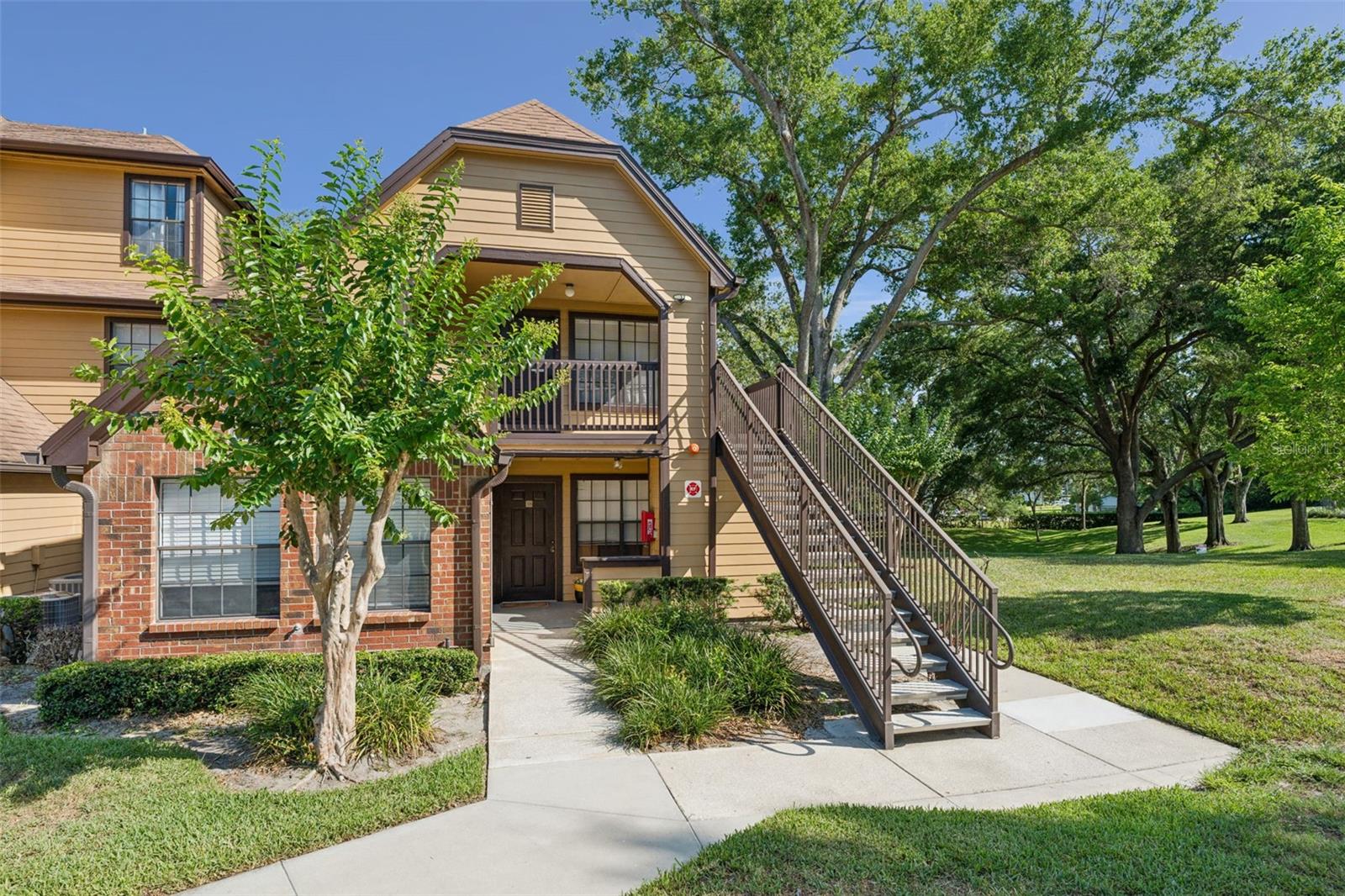 Great value for this light & bright FIRST FLOOR condo in a beautifully-maintained community in the heart of Altamonte Springs! This well kept condo could not be in a more convenient location. Located in a gated, lakefront community in close proximity to the Altamonte Mall, Uptown Altamonte, Cranes Roost Park and surrounded by a plethora of great dining and shopping! Rare end unit with a wall of light & bright windows overlook a serene greenbelt. Both roomy bedrooms have ensuite baths and large walk-in closets. Nuetral paint & attractive vinyl flooring throughout! (wallpaper-looking stickers in living room are easily removed) No carpet! Electric fireplace in the living room adds a cozy ambiance. There is a spacious storage closet for all of your things located within the covered porch. Lakewood Park is a lakefront community on the shores of beautiful Lake Orienta and has resort-like amenities including access to Lake Orienta, 2 swimming pools, hot tubs, a fitness center, tennis courts, sand volleyball, and a clubhouse with a private movie theater! Boat and RV storage provided for an additional fee. This is a terrific place to live or have an income-producing opportunity!