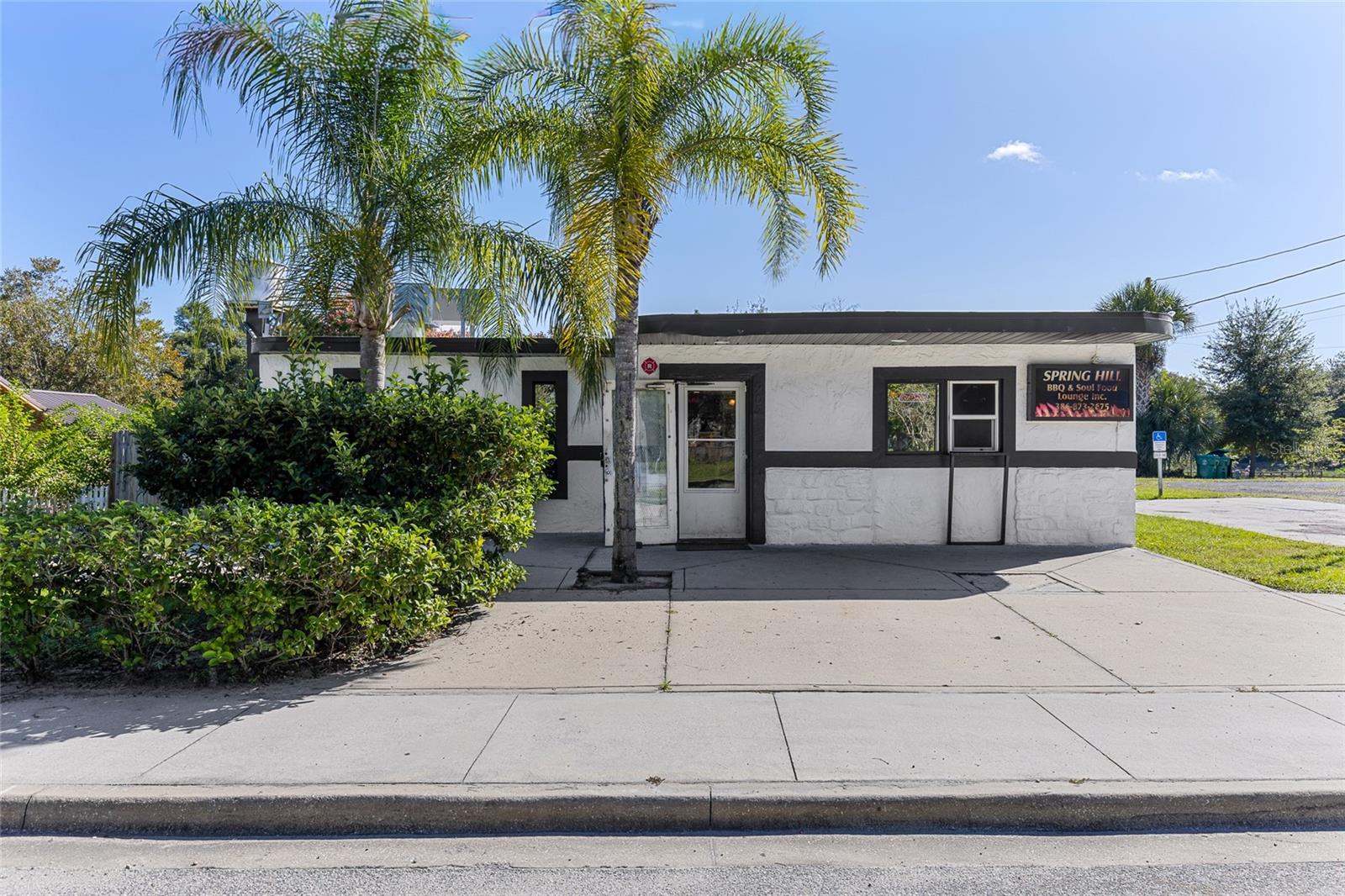 **JUST REDUCED** ACT NOW ~ Endless Opportunities Here ~ Prime location near Downtown Deland, Stetson University, the famous Melching Field at Conrad Park, Neighborhood Walmart, Restaurants and Shops ~ Close in vicinity to Hwy 17-92 and Spring Garden Avenue both have HIGH TRAFFIC VOLUME ~ New HVAC unit, Updated Electrical Panel, Roof less than 2 years old ~ Fully functioning kitchen ~ Fantastic private outdoor patio allows plenty of space for seating and events ~ Metal canopy provides excellent protection for those outdoor events ~ Outdoor Tiki Bar in place to enhance the joy of entertaining ~ Currently zoned Bar/Lounge.  **The seller is also selling property directly across the street at 918 S Adelle Avenue (MLS# O6344077), which could be an excellent opportunity to expand your business**  
All information and property details is thought to be correct but not guaranteed and should be independently verified by the buyer/buyer’s agent. Contact the County Planning/Zoning department to confirm any usage restrictions.