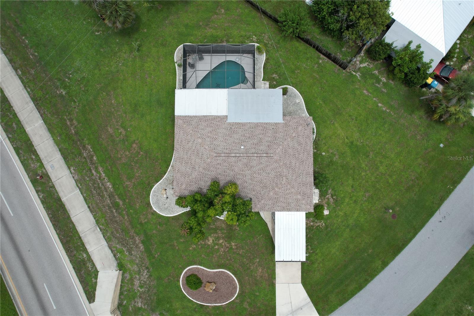 Nicely updated and move-in ready, this charming 2-bedroom, 2-bath pool home sits on a spacious cul-de-sac lot (No through traffic) in the heart of Port Charlotte's desirable waterfront area, directly across from William R. Gaines Jr. Veterans Memorial Park, where you can enjoy an active Florida lifestyle with pickleball and tennis courts, a playground, fishing pier, kayak launch, and beautiful waterfront park just steps from your front door. Inside, you'll find a bright, open floor plan with attractive luxury vinyl plank flooring throughout the main living areas, a spacious living room, an updated kitchen with abundant cabinetry and stainless steel appliances, and a large dining/family room overlooking the pool—perfect for everyday living and entertaining. Step outside to your private backyard oasis featuring a sparkling screened pool, expansive covered and screened lanai, and plenty of yard space to relax or entertain. The second full bathroom is conveniently accessed from the garage and includes a shower, two closets, and a stackable washer/dryer hookup.  Additional updates include a new roof (2023), new pool pump (2024), new water heater (2025), and manual storm shutters for added peace of mind. Whether you're searching for a full-time residence, winter retreat, or investment opportunity, this updated home offers exceptional value in one of Port Charlotte's most beautiful areas.  *** Excellent location, convenient to the Port Charlotte Beach, Shopping & Dining, Gulf beaches, THE BEST GOLFING, BOATING & FISHING IN SOUTHWEST FLORIDA, Downtown Punta Gorda, North Port, medical, schools, Charlotte County Sports Stadium – home of Tampa Bay Rays Spring Training, and so much more!!! Enjoy fishing or kayaking in your back yard or go boating out to the Harbor and the Gulf via nearby boat ramps for a great day of fun in the sun!!! *** All measurements and details provided should be verified by buyers. *** Dishwasher does not work.