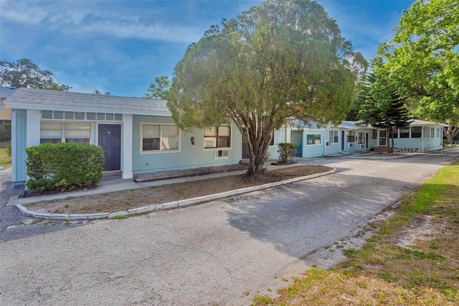 Exceptional investment opportunity in perfect Clearwater location. Featuring a 6-unit multifamily property on an oversized lot with abundant on-site parking and additional owner storage shed. This professionally managed asset offers strong cash flow with an excellent cap rate and 5 of 6 units currently occupied, providing immediate income with one vacant unit available for easy showings or owner occupancy. All units have been renovated and in great shape! This is ideal for investors seeking a stable, turnkey asset in a high-demand rental corridor near Dunedin and Clearwater. The flexible layout presents multiple strategies: continue operating as a high-performing income property, increase rents over time, or live in the larger primary unit while the remaining units offset expenses and generate passive income. Tenants love the location with quick access to vibrant downtown Dunedin restaurants, breweries, shopping, and waterfront parks. Enjoy stunning Gulf Coast sunsets along Edgewater Drive and easy access to world-famous Clearwater Beach. Convenient to major employment centers, beaches, recreation, and entertainment, this property has consistently attracted reliable tenants and has been easy to lease. Additional highlights include ample parking, large lot size with future potential, owner storage, strong rental history, and pride of ownership throughout. Property has experienced no flooding or storm-related issues during ownership, offering added confidence for long-term investors. Rare opportunity to acquire a well-positioned multifamily asset in one of Pinellas County’s most desirable rental markets.