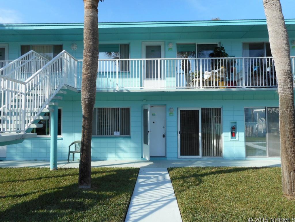 What a great little condo complex in the heart of New Smyrna Beach with all of the amenities you could ask for! This first floor unit is directly across from the inground community swimming pool and is within walking distance of the river, restaurants and shops. The complex is small and quaint with only two stories for each building with a total of two buildings with river views. Your maintenance fees cover the building insurance, basic cable, clubhouse, common area, lawn care, pest control, community pool, water, sewer and trash. The inside boasts two bedrooms, two bathrooms, full kitchen with breakfast nook, living room overlooking the front pool area and has ceramic tile through making cleaning easy! The master bedroom has a large walk-in closet and 2nd bedroom has a California closet for good storage. The bathroom has a full tub, ceramic tile floor and a single vanity. This great condo won't last long so come show, see and buy! This is a Fannie Mae HomePath property! ;LocationDescription: Condo ;Water: City