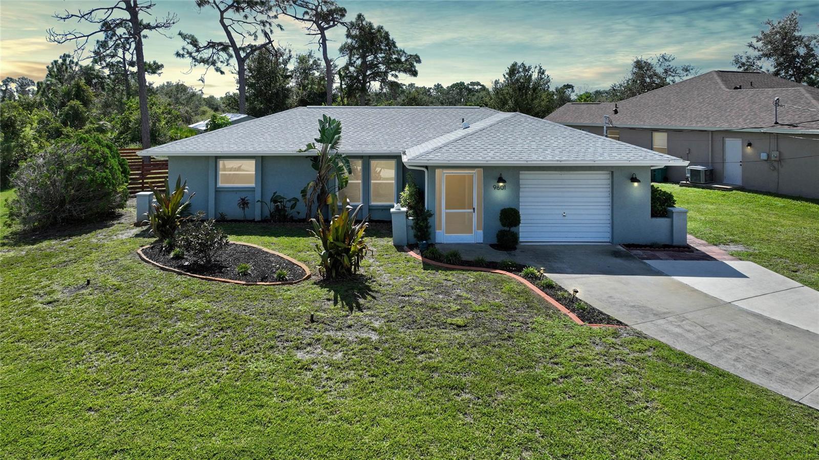 ***$45,000 PRICE REDUCTION***
Cute as a button, Corner lot...completely remodeled Florida style home in historic Englewood. House and Driveway face Castleberry Terr NOT Gulfstream!!!  Fully fenced, allergen free luxury vinyl plank flooring throughout, new Hurricane Impact windows, backsplash in kitchen, fully tiled shower…no fiberglass insert here! New lighting, Stainless Steel appliances, backsplash, and freshly painted inside and out…Nothing left to do but move in! Plus 12'x18' air conditioned Workshop that current owner utilized as an Art Studio. 10 minutes to the beaches! The Master Suite has a walk in California closet, en-suite bathroom, and large sleeping area that easily accommodates a king size bed, side tables, and dressers. The split floorplan offers guests & homeowners privacy, with an open concept central living space. Dining room has French doors leading out to the Florida room, and garage entrance is off the foyer. Enjoy the Florida weather sipping your morning coffee from that large 17’x10’ Florida room. The oversized backyard has plenty room for a pool! Egress door in garage for easy access to garbage bins & A/C condenser. Not located in a flood zone, NO FLOOD INSURANCE NEEDED and this home’s annual insurance costs are less than $2,000 a year! With a BRAND NEW ROOF, no worries over roof, plumbing, electrical, or even painting…this home will provide years of peace of mind and low maintenance! Spend your time relaxing and enjoying…5.4 miles (10 minutes) to Englewood Beach, 2.8 miles to the nearest Golf course, 4.1 miles to the nearest public boat launch, and only 1 mile to a grocery store. Banking, medical services, shopping, restaurants all nearby; take in a ballgame at the Rays Stadium down the road, or venture into historic Englewood & Venice. Call and schedule your private tour!